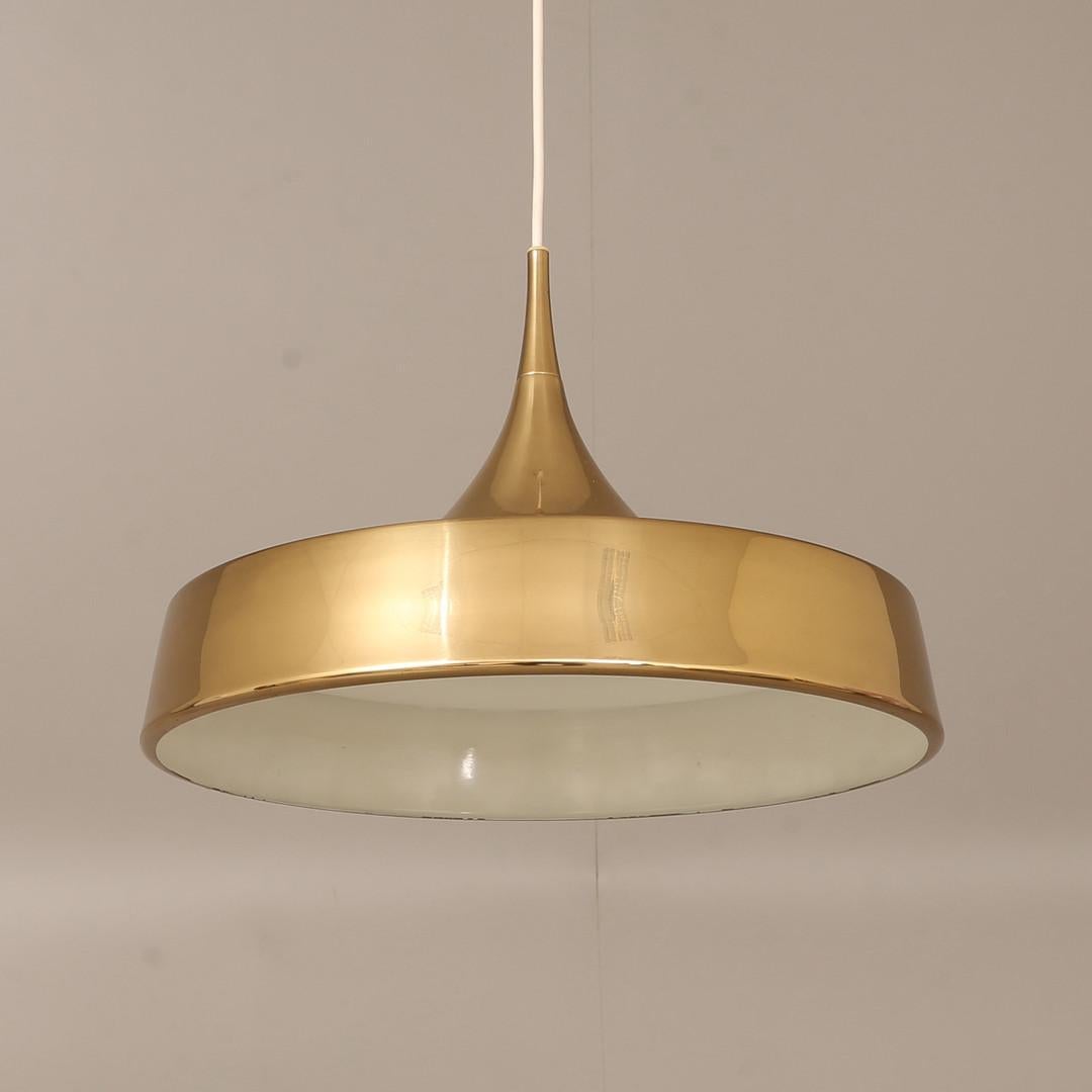 This unique design by Bergboms has original wiring. Great vintage condition. 
Bergboms—also called Bergbom & Co AB—was a modernist, Swedish lighting manufacturer established in 1940. The company’s founder, Efraim Ljung, was a business mogul who