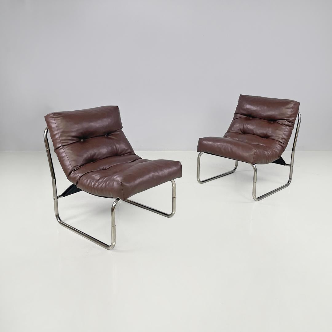 Swedish modern brown faux leather armchairs Pixi Gillis Lundgren for Ikea, 1970s
Pair of armchairs mod. Pixi in brown synthetic leather. A single padded cushion with eight buttons makes up the seat and backrest, the back is in black fabric. The