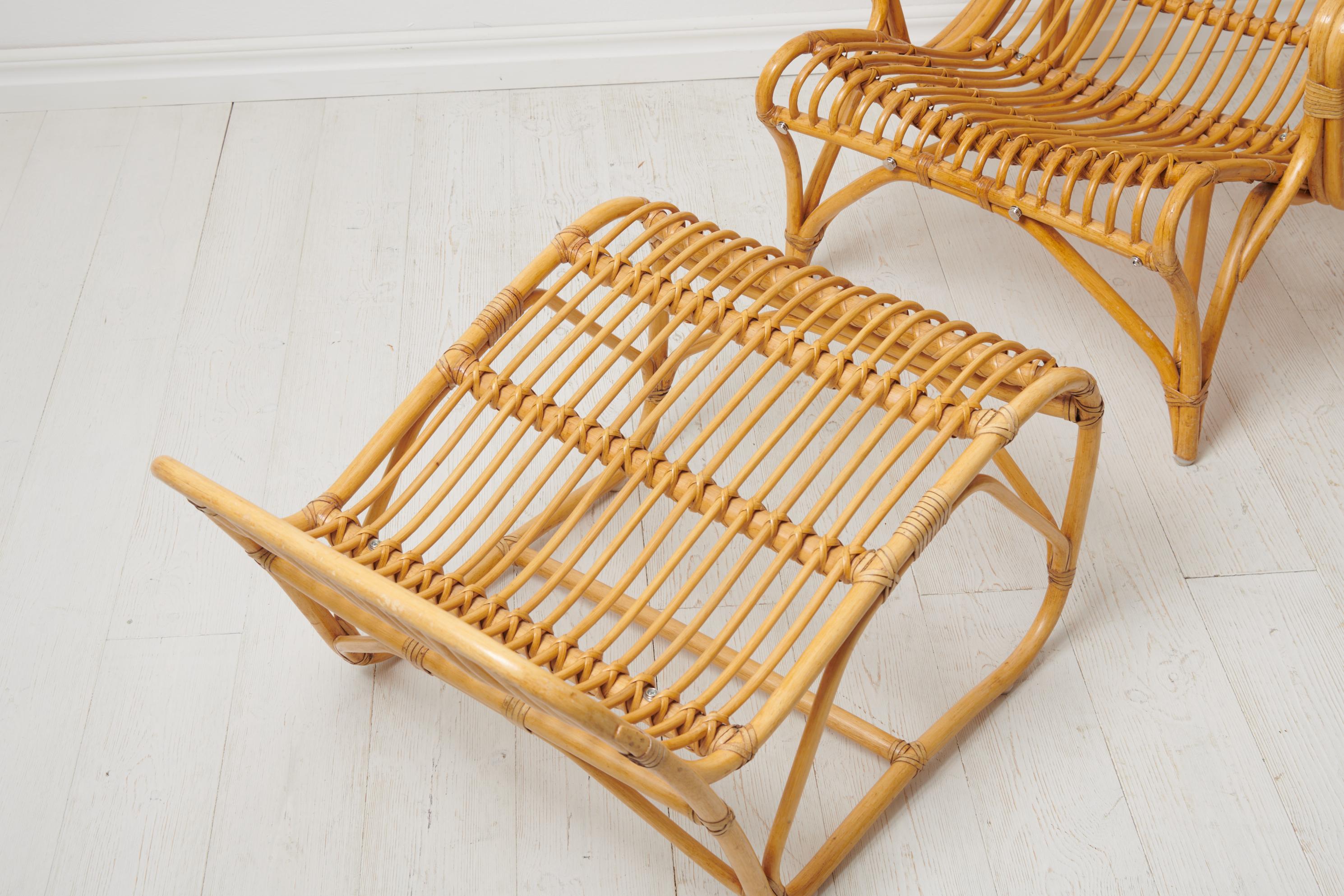 Swedish Modern Bruno Mathsson Pair of Rattan Lounge Chairs and Footstool For Sale 5