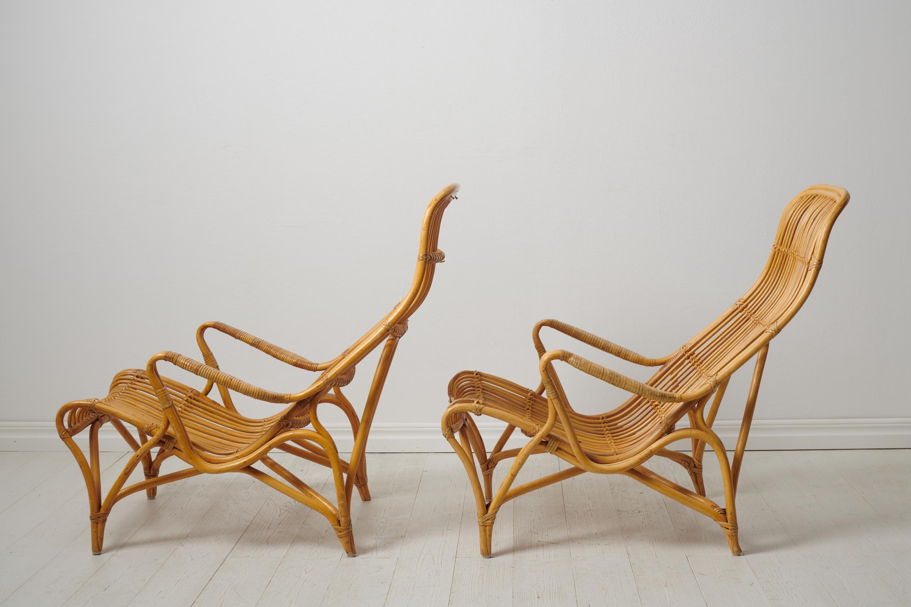 Swedish Modern Bruno Mathsson Pair of Rattan Lounge Chairs and Footstool For Sale 1