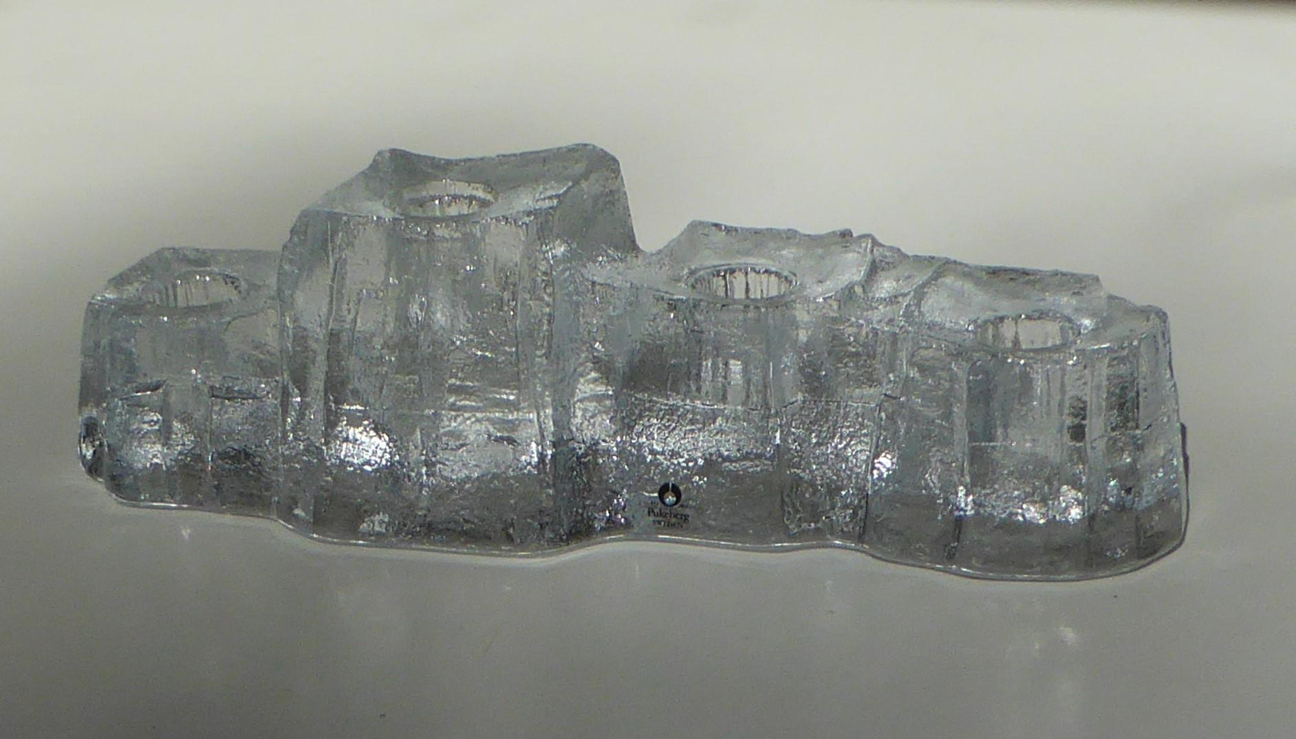 Scandinavian Modern Brutalist lead glass candleholder attributed to Uno Westerberg. Inspiration from the snow and ice covered mountains of Scandinavia, here you have a 1970s highly textured 4 candleholders by Pukeberg Glassworks of Sweden. In very