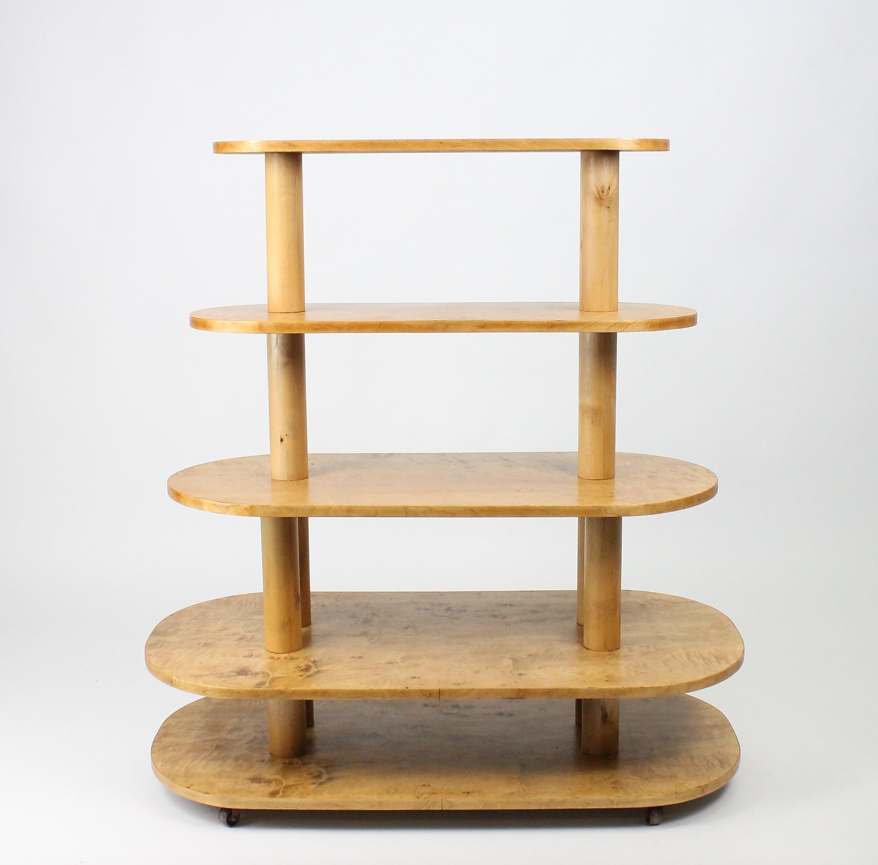 Fantastic shelf made by Nordiska Kompaniet to be used in their own store (NK) in Stockholm. It was used in the 1930s to display different objects that were up for sale. Very rare!

Made in golden birch and now restored into great condition.