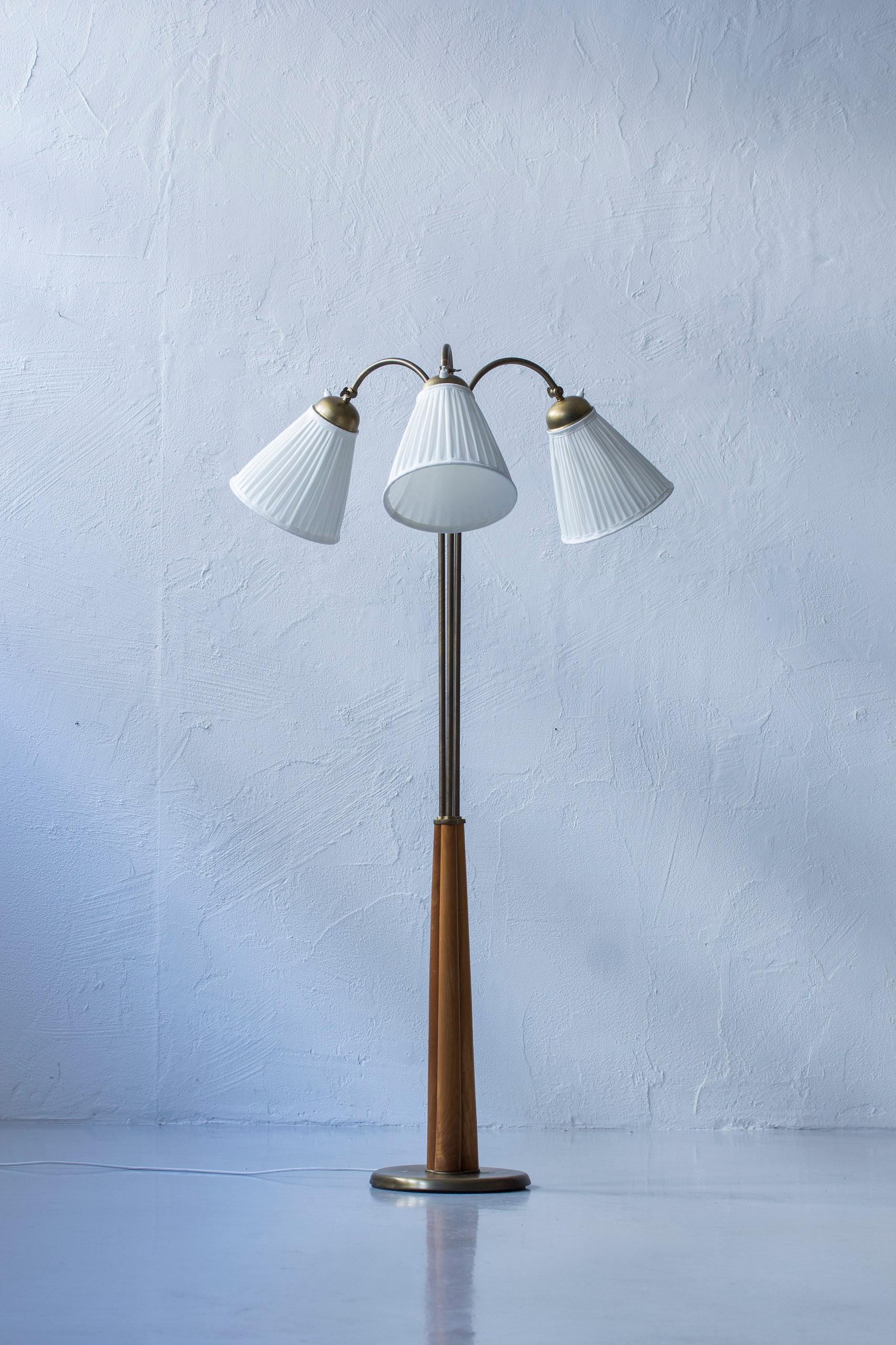 Swedish modern floor lamp elm and brass with three arms, Sweden, 1940s 6