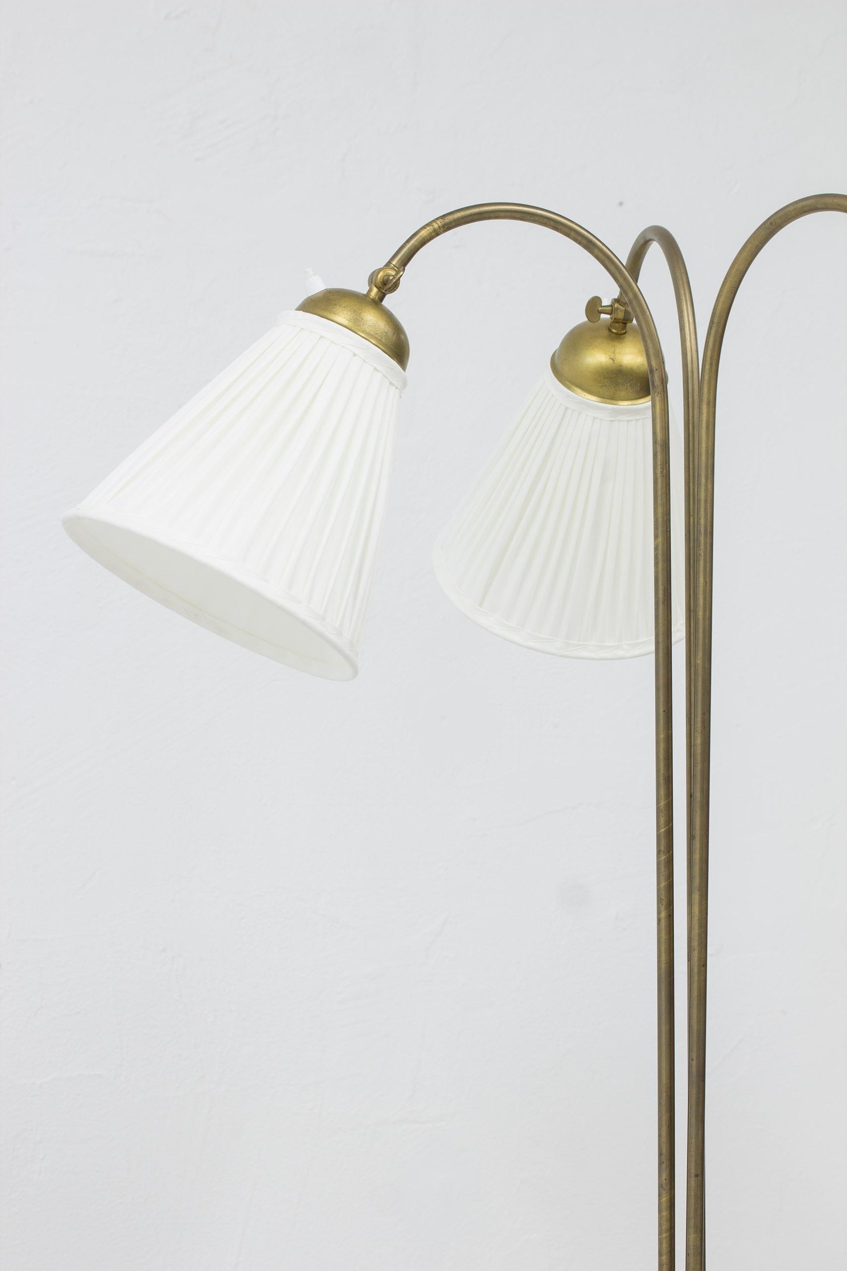 Swedish modern floor lamp elm and brass with three arms, Sweden, 1940s In Good Condition In Hägersten, SE