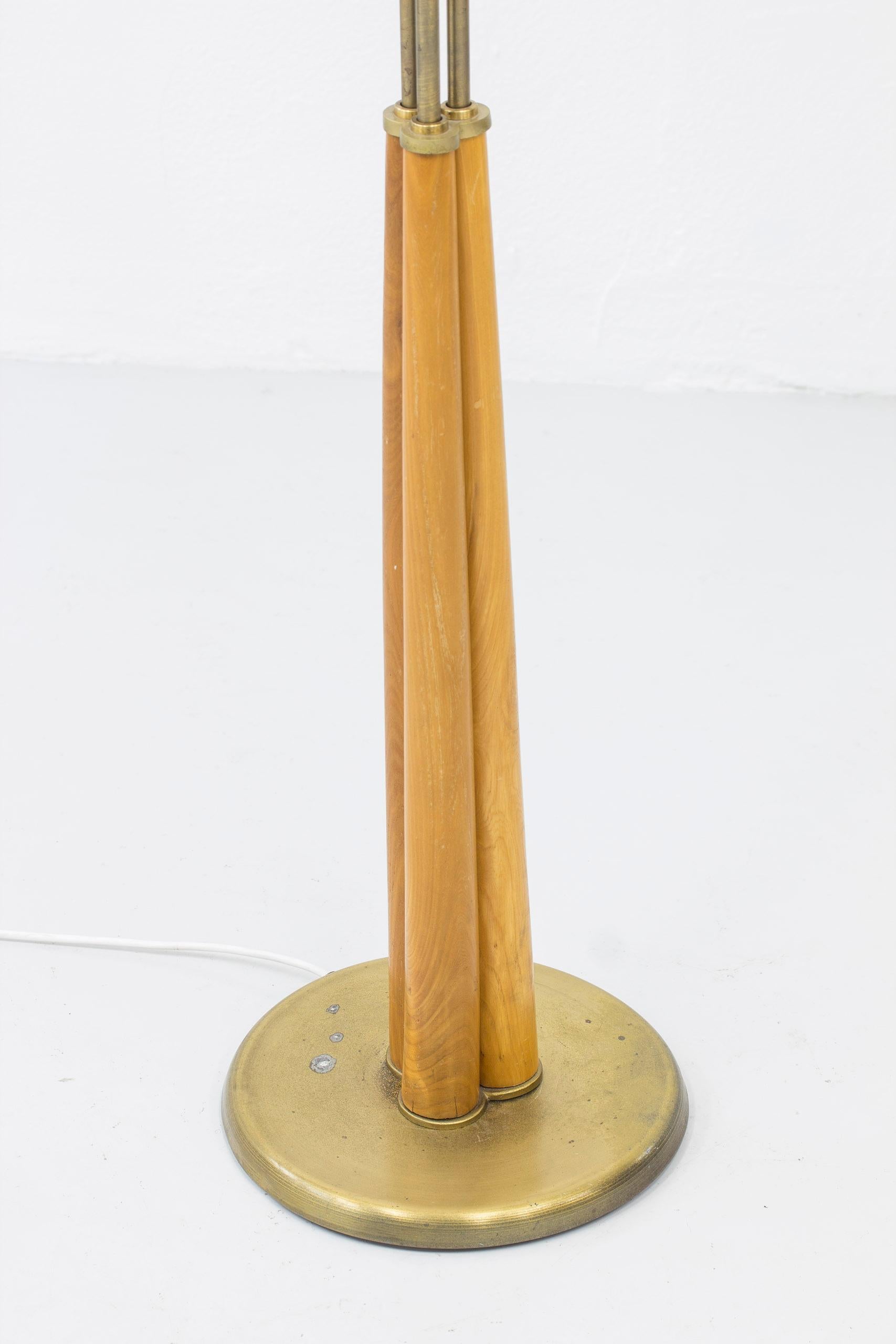Swedish modern floor lamp elm and brass with three arms, Sweden, 1940s 3