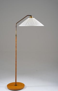 Swedish Modern Floor Lamp in Rattan and Brass, 1940s