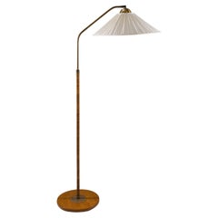 Swedish Modern Floor Lamp in Rattan and Brass, 1940s