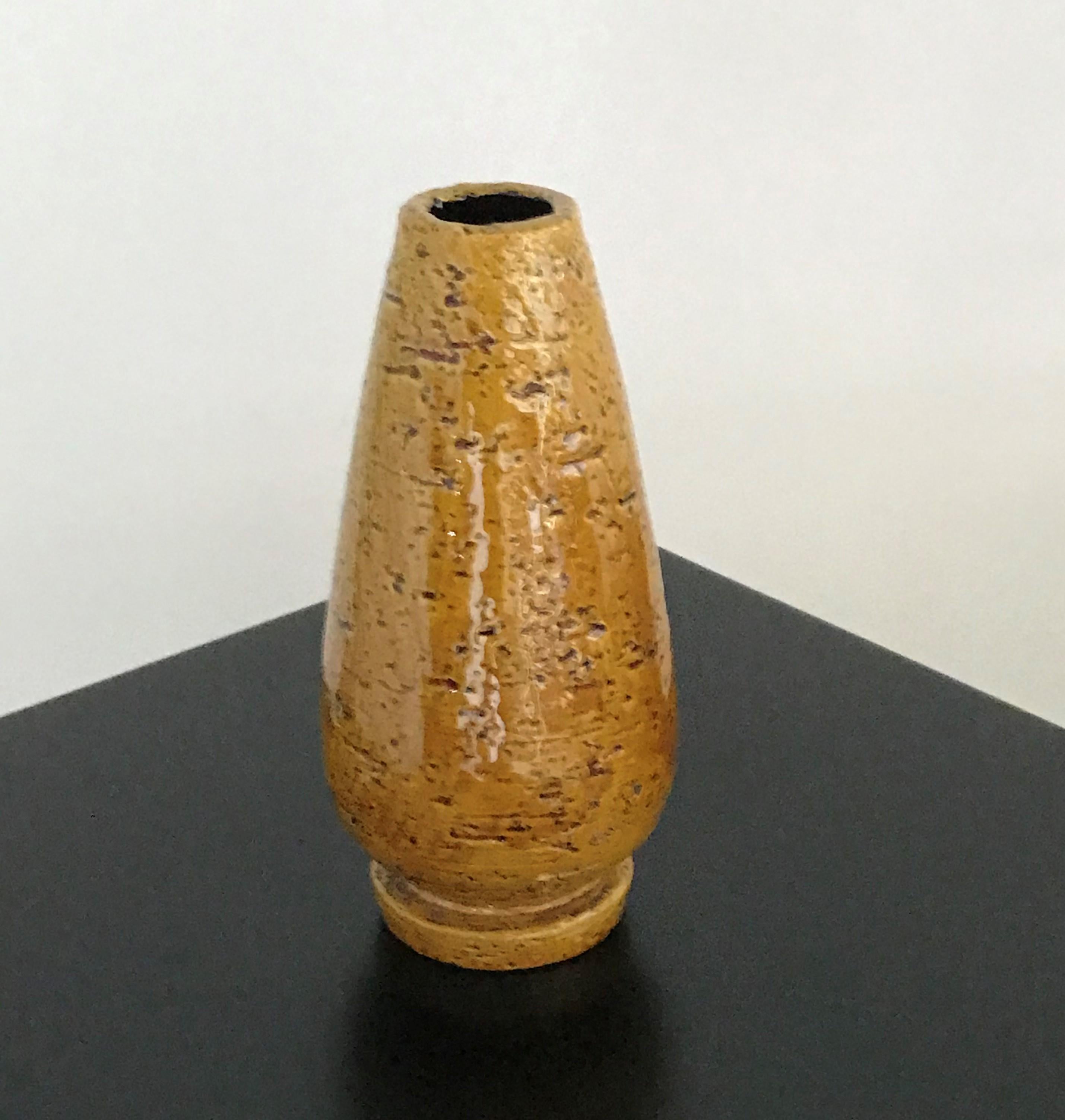 REDUCED FROM $350...Exquisite creation by Gunnar Nylund (1914–1997) during his tenure as artistic director of Rörstrand from 1932 through the 1950s. The vase has a glossy spicy mustard yellow glaze over a rough rustic body creating a smooth touch