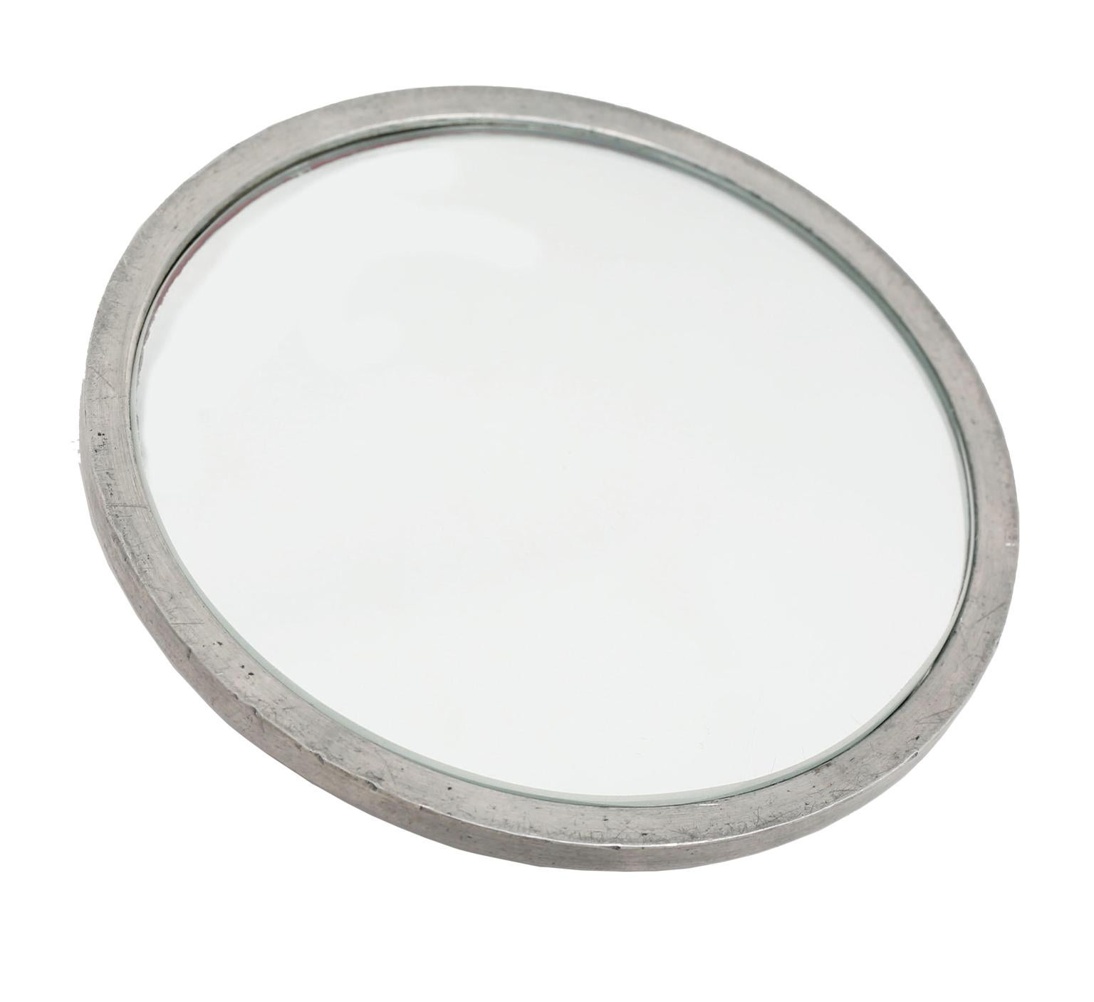 Swedish modern hand mirror by Estrid Ericson from Firma Svenskt Tenn. Made in pewter with brass handle. Model number A 1497.
According to the Firma Svensk Tenns production papers: 