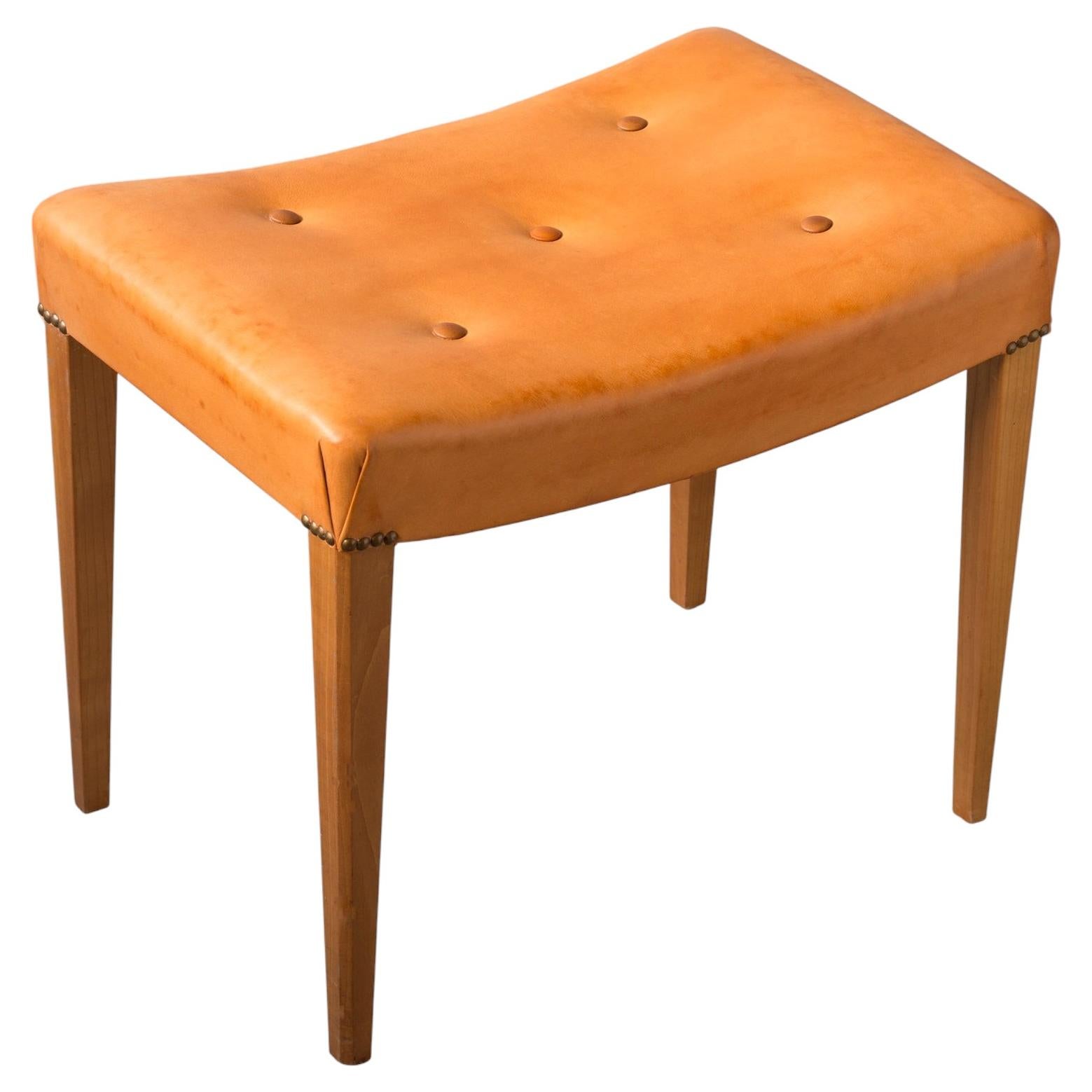Swedish modern Leather and elm stool "Katie" by Axel-Einar Hjorth, NK 1930s
