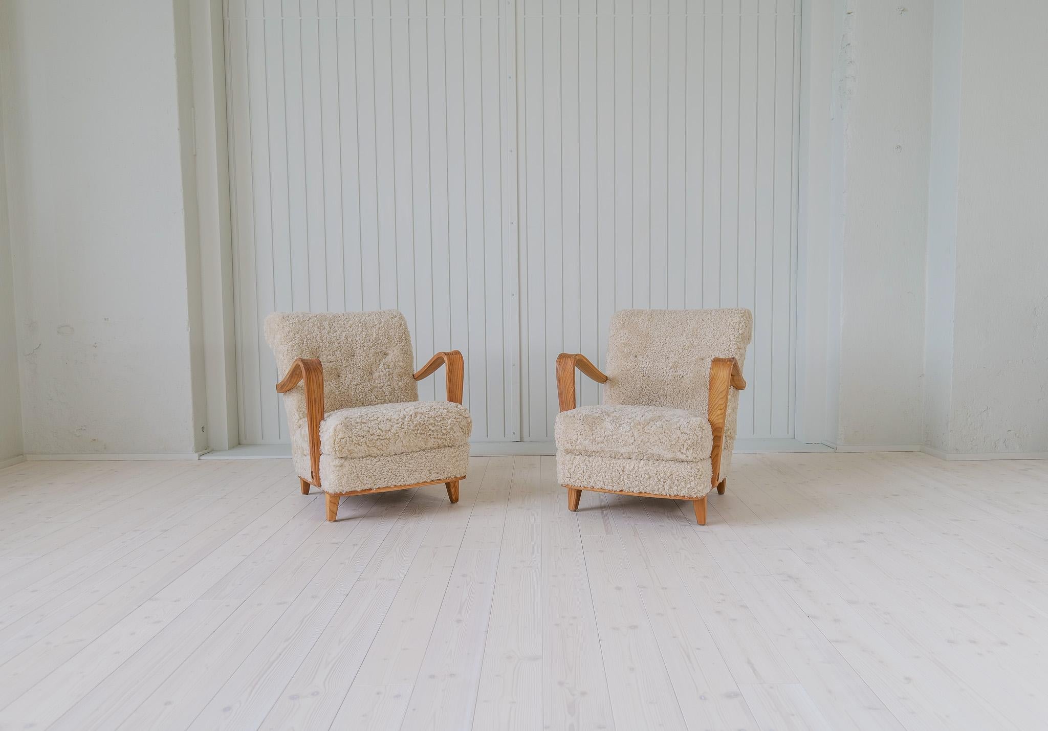 Art Deco Swedish Modern Lounge Chairs in Shearling / Sheepskin and Elm, 1940s For Sale