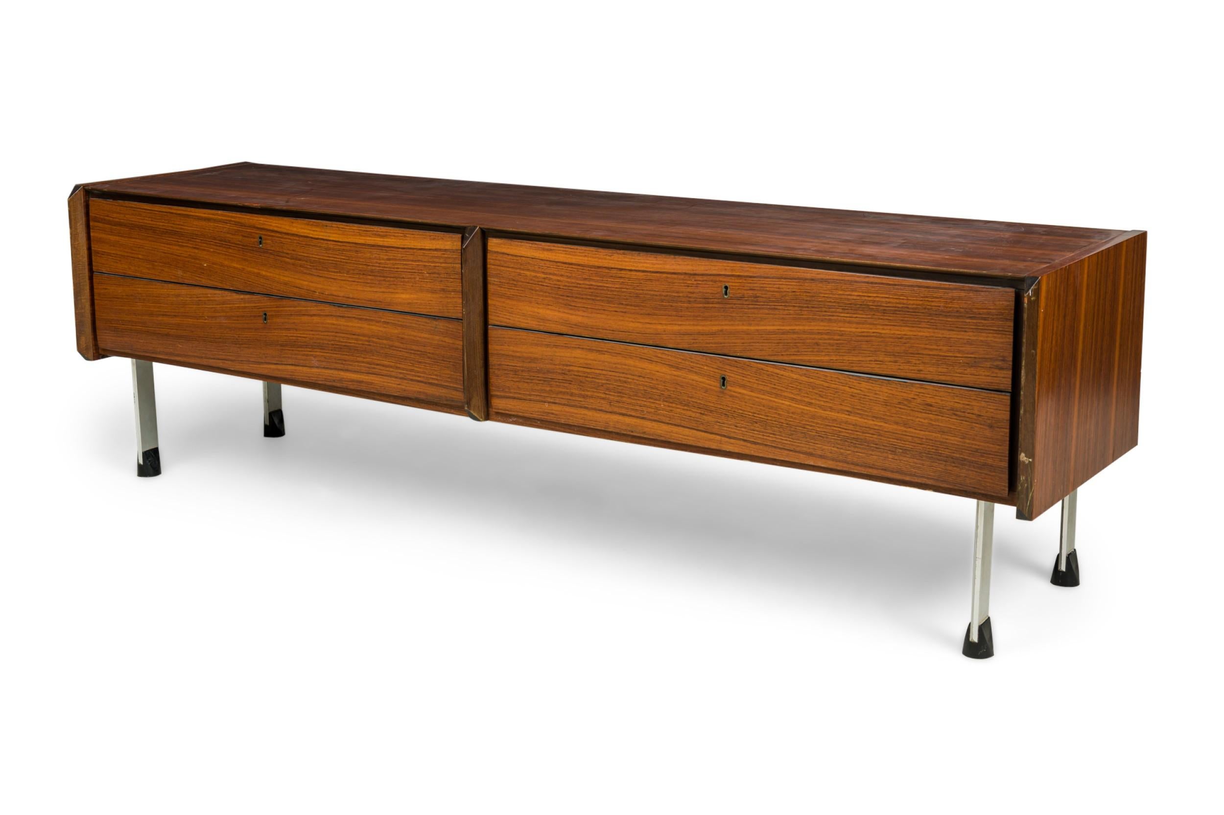 Swedish Mid-Century rosewood low buffet / sideboard with 2 pair of drawers and narrow chrom metal legs ending in a black form sabot
