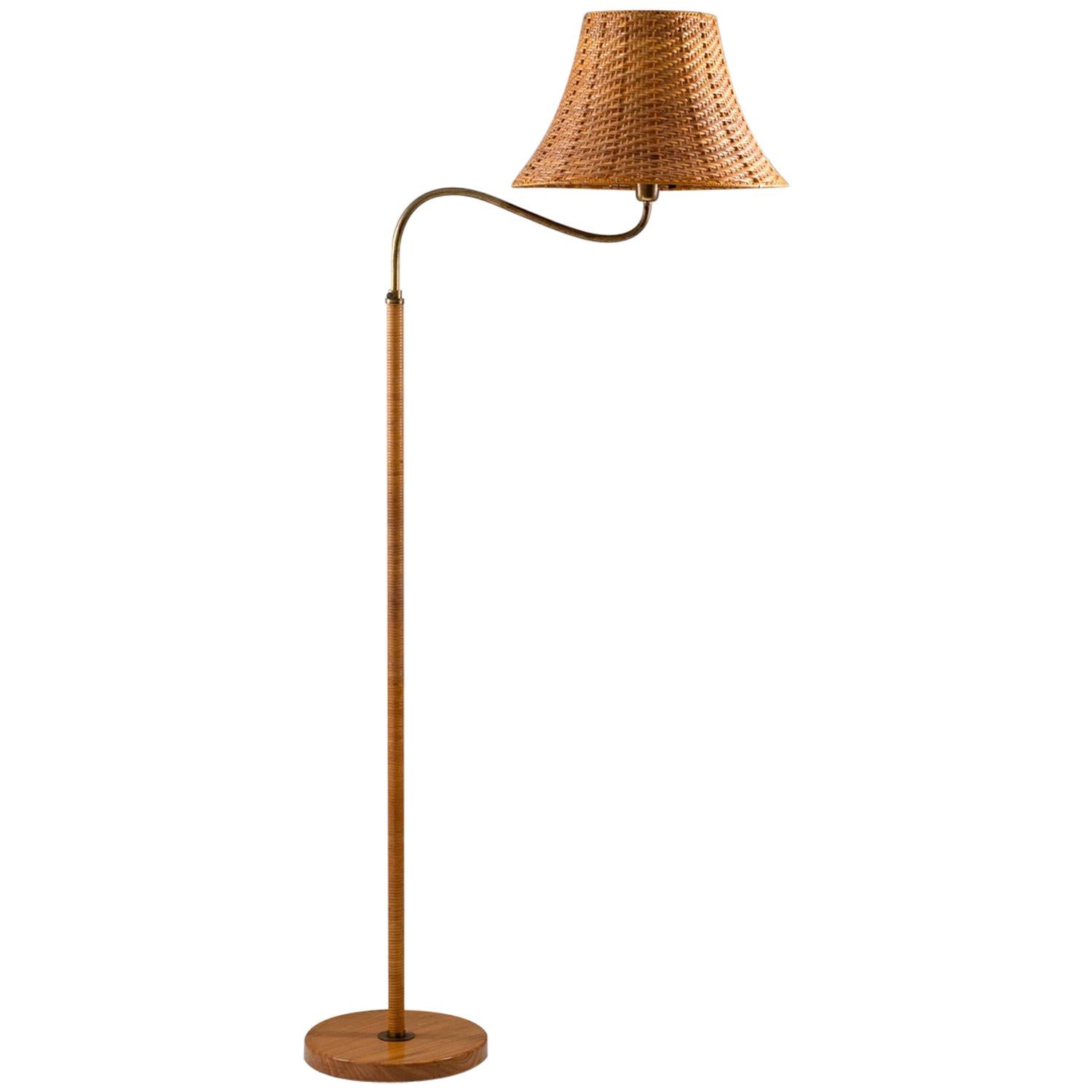 Swedish Modern Midcentury Floor Lamp in Brass and Rattan, 1940s