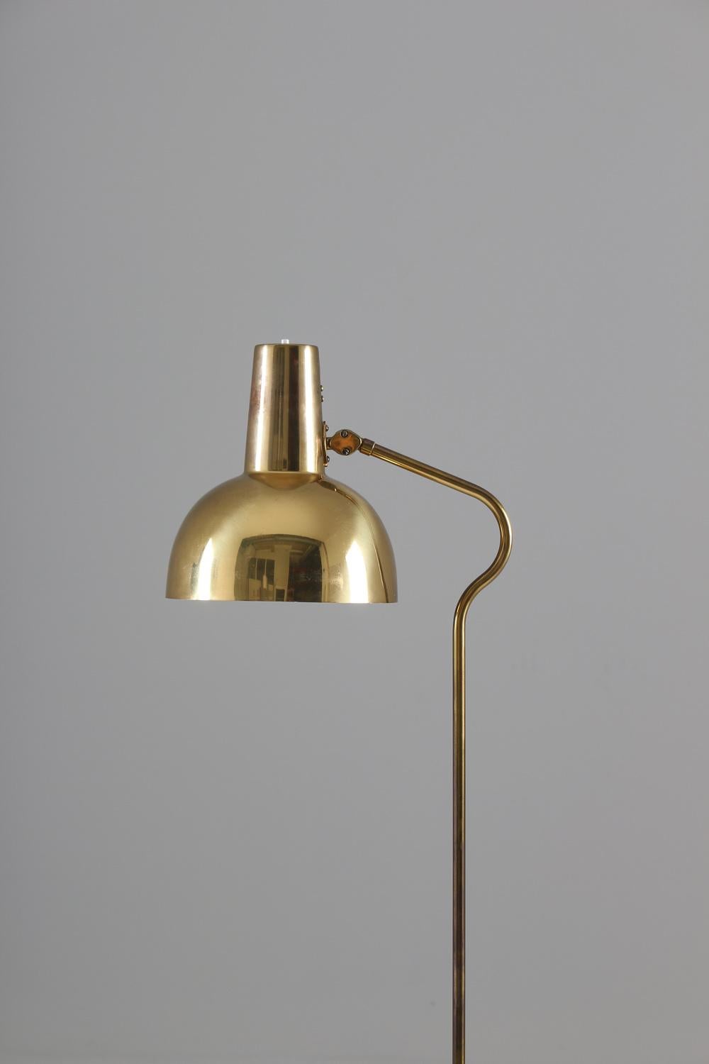 Floor lamp manufactured by ASEA, Sweden, 1960s.
Beautiful floor lamp in solid brass with adjustable shade. The stem is slightly cone-shaped and ends with a turn where the shade is fixtured.
Height 150-180cm
Condition: Good original condition with