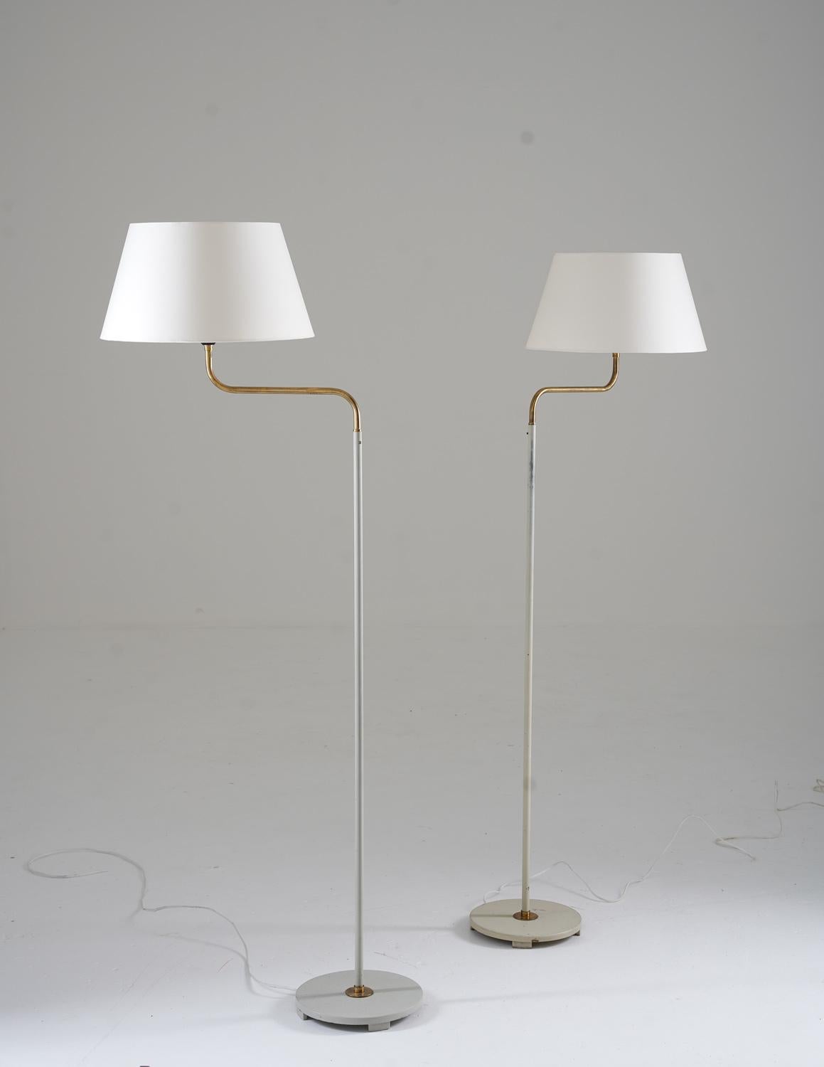 This beautiful set of floor lamps, manufactured by the renowned ASEA company during the 1950s, is a versatile and stylish addition to any room. The design of these lamps is truly striking, featuring a sleek and sophisticated combination of metal and