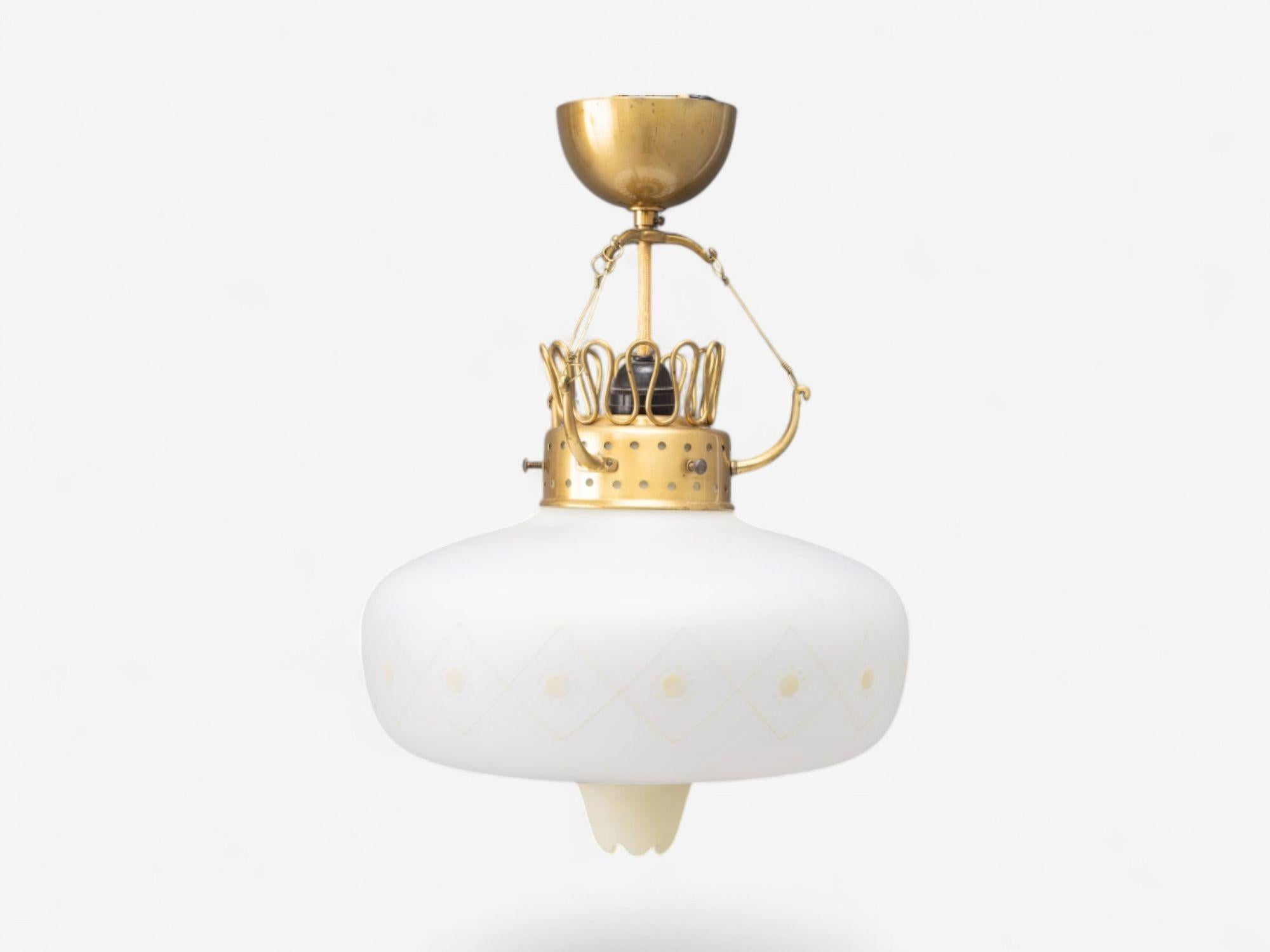 Swedish Modern, Opal Glass, Patinated Brass, Pendant Light, Chandelier, Sweden, 1940s

Scandinavian mid-century modern pendant light designed and produced in Sweden in the middle of the 20th century. This example has a unique patinated brass hanging