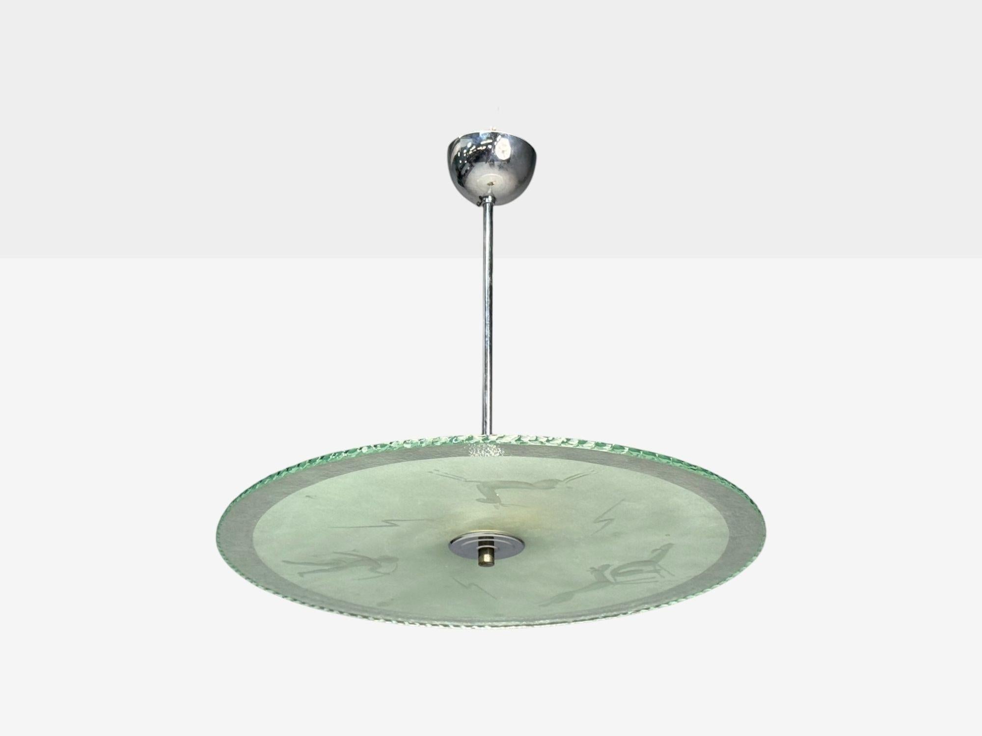 Swedish Modern, Raw Glass, Metal, Pendant Light, Sweden, 1940s

A unique Scandinavian modern raw glass and metal pendant light designed and produced in Sweden c. 1940s. This example features raw glass with partially frosted decoration depicting an