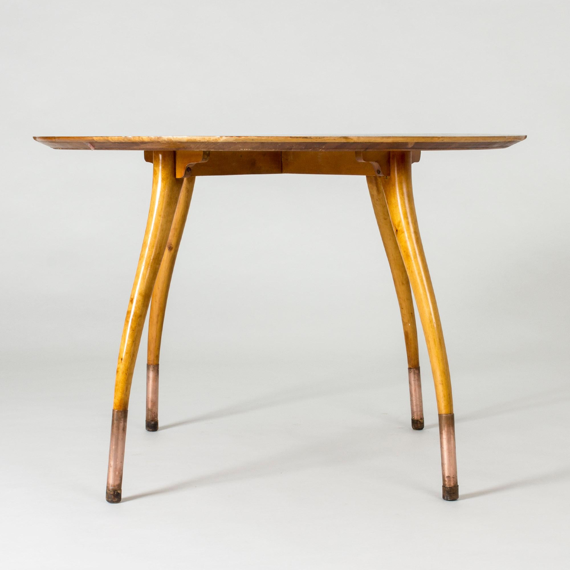 Beautiful Swedish modern occasional or playing table, made with a stunning root tabletop. Elegantly curved beech legs, copper-clad at the base.