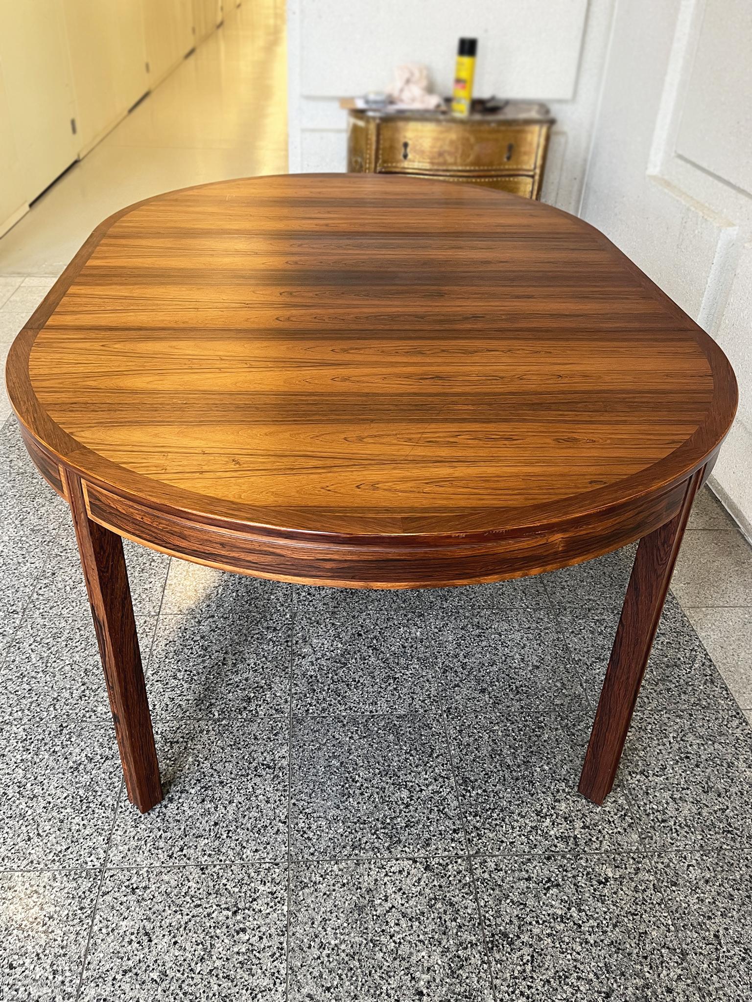 20th Century Swedish Modern Rosewood Extendable Dining Table by Bertil Fridhagen