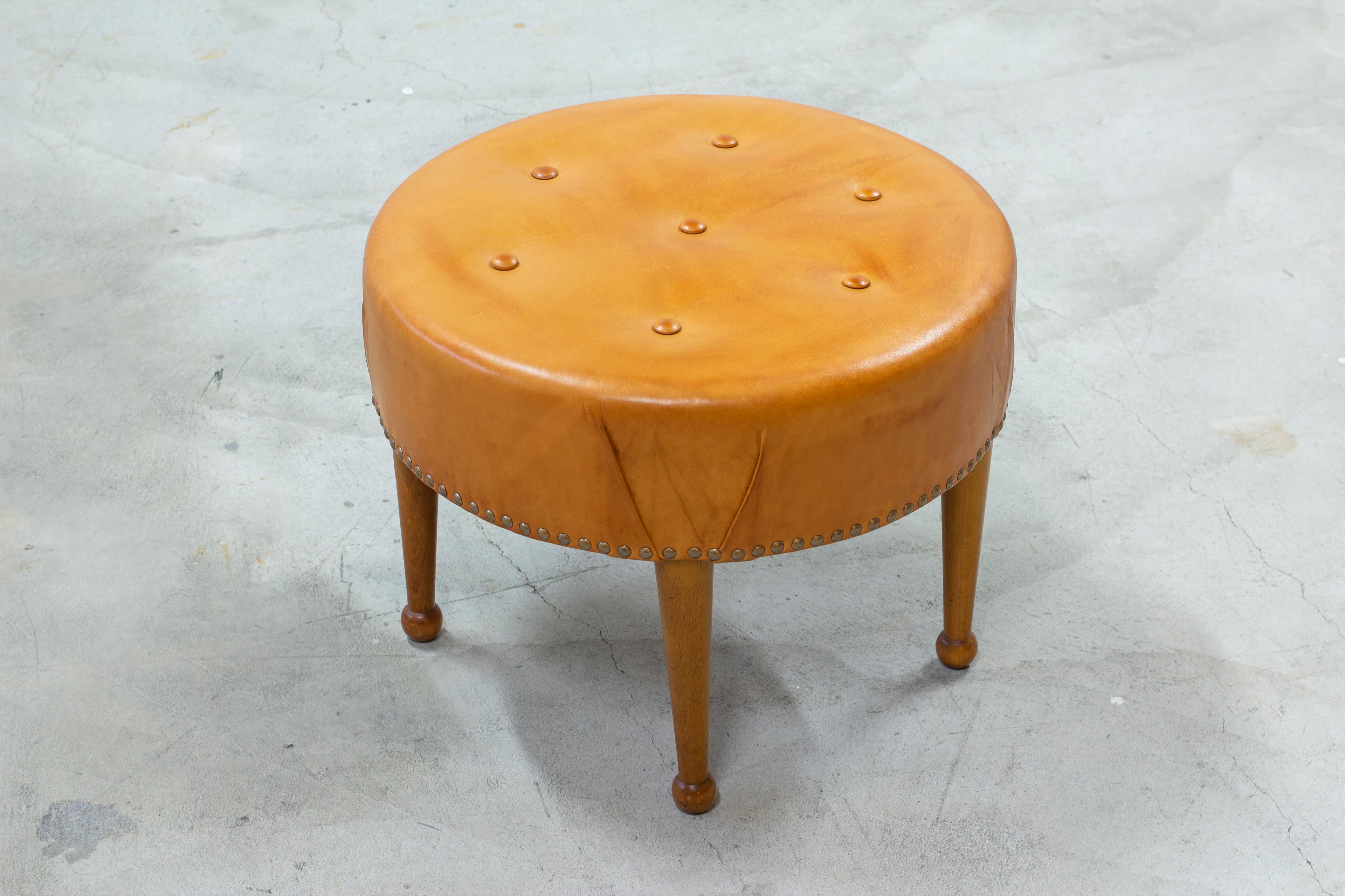 Scandinavian Modern Swedish modern round leather tabouret in the style of Josef Frank, 1940s
