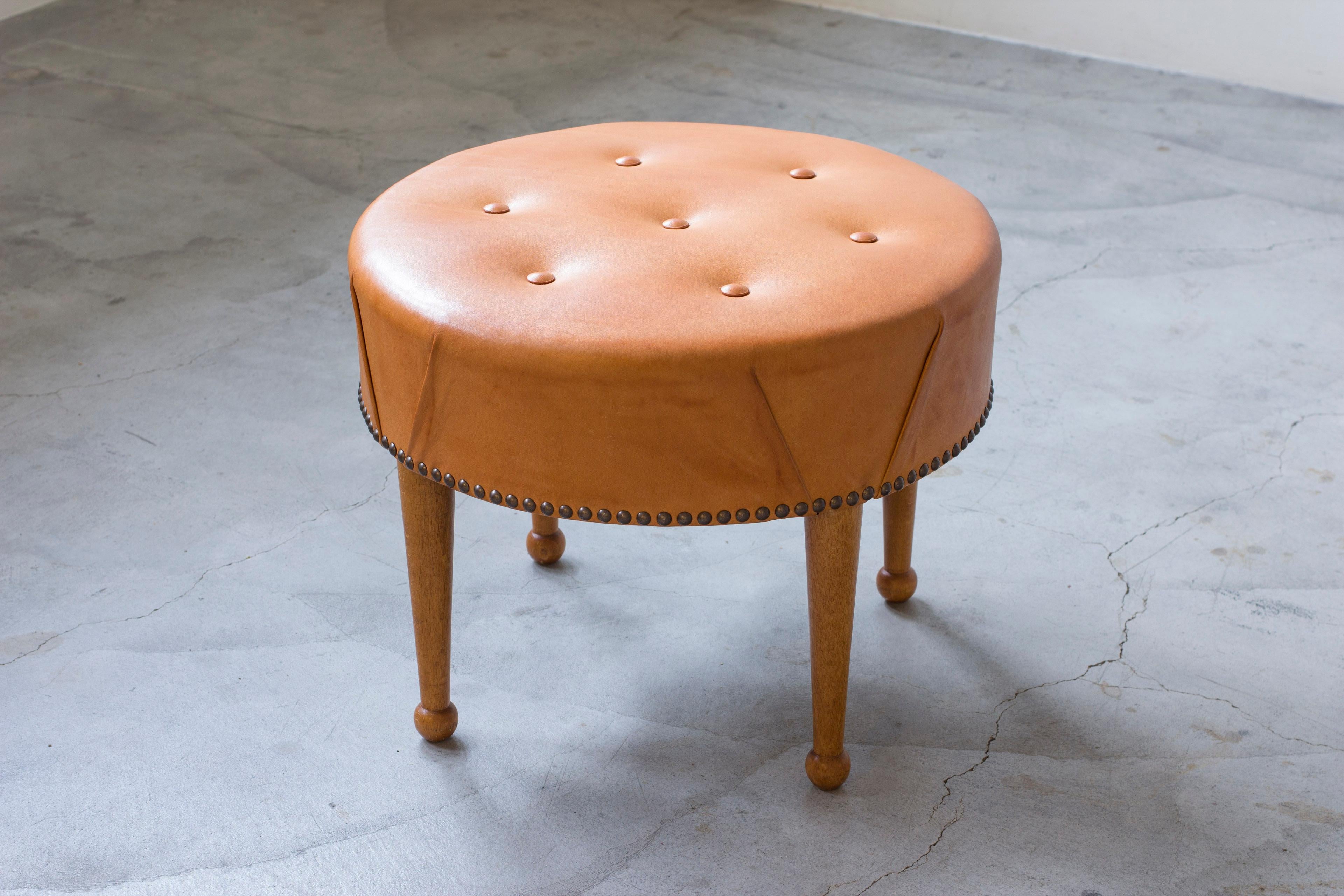 Scandinavian Modern Swedish modern round leather tabouret in the style of Josef Frank, 1940s For Sale