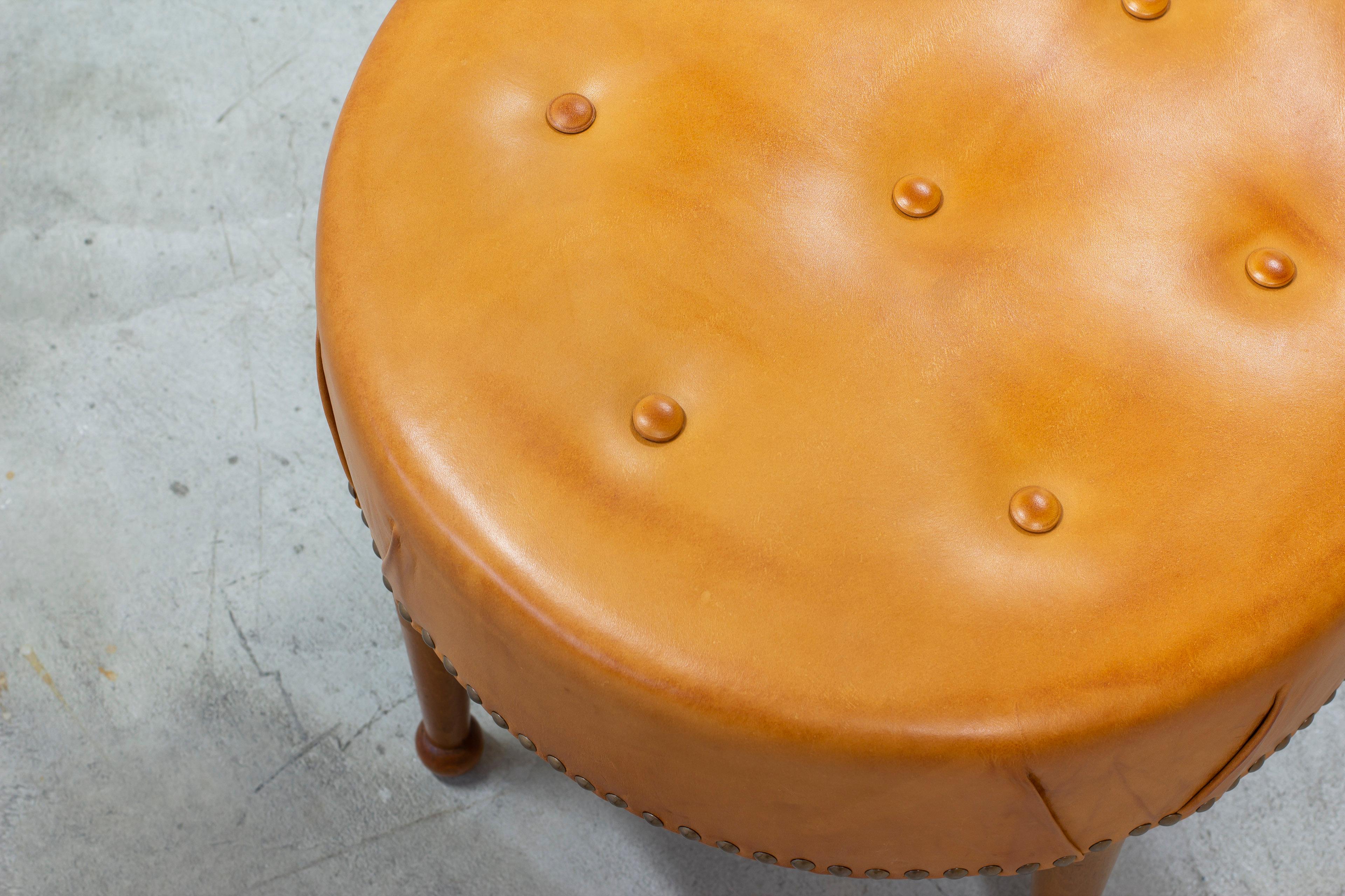 Swedish modern round leather tabouret in the style of Josef Frank, 1940s 1