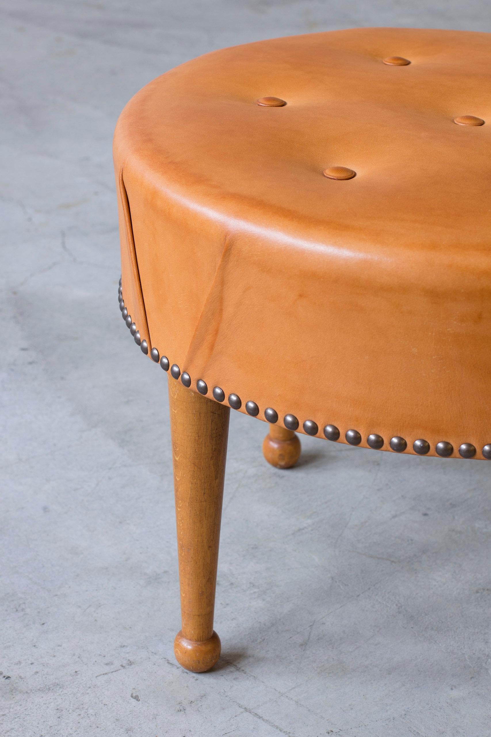 Swedish modern round leather tabouret in the style of Josef Frank, 1940s For Sale 1