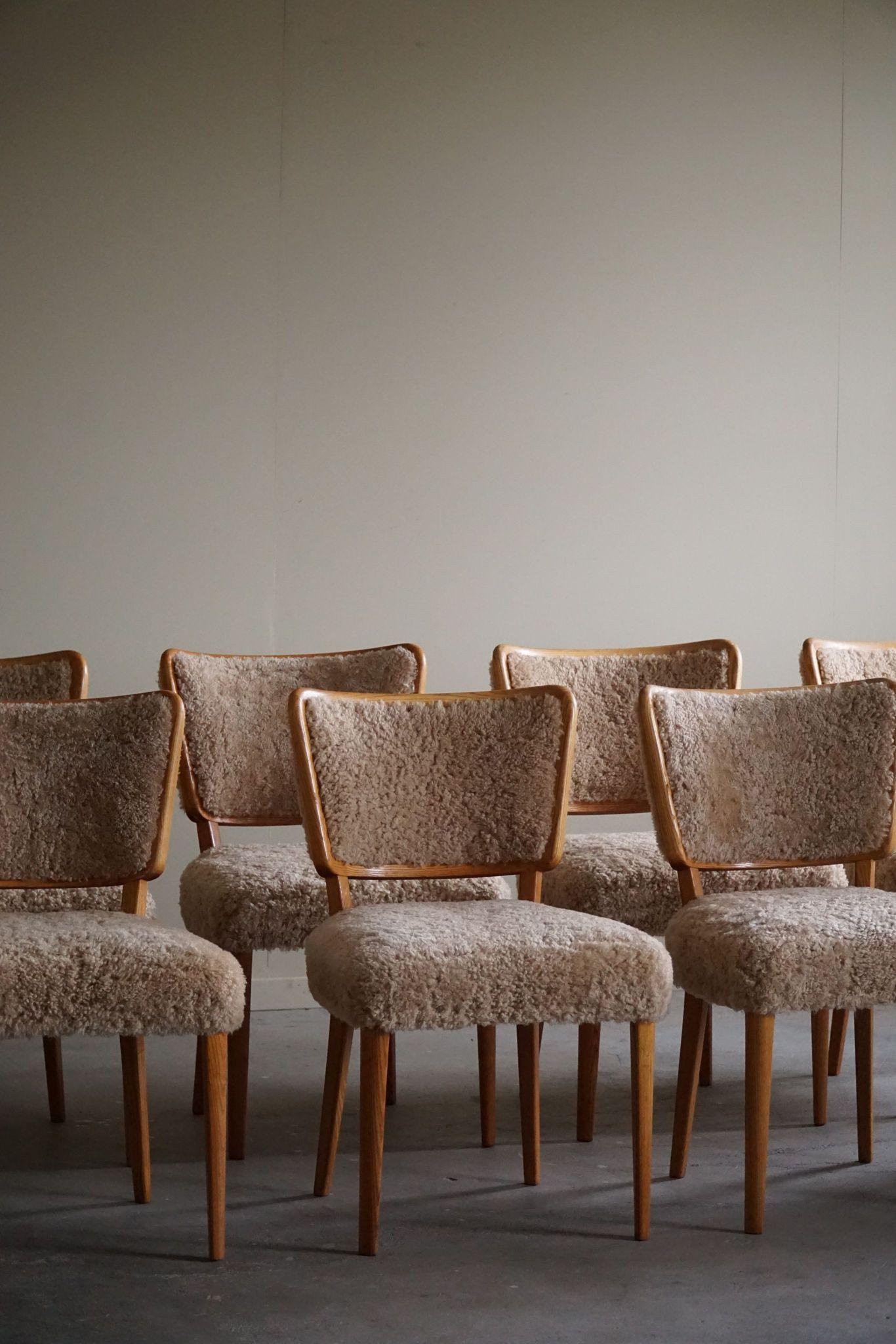 Introducing an exquisite set of eight dining chairs that embody the timeless elegance of mid-century Swedish modern design. Crafted by furniture company Innternung AB Malmö Kåpe in the 1950s, labeled underneath. 

Each chair features a sleek frame