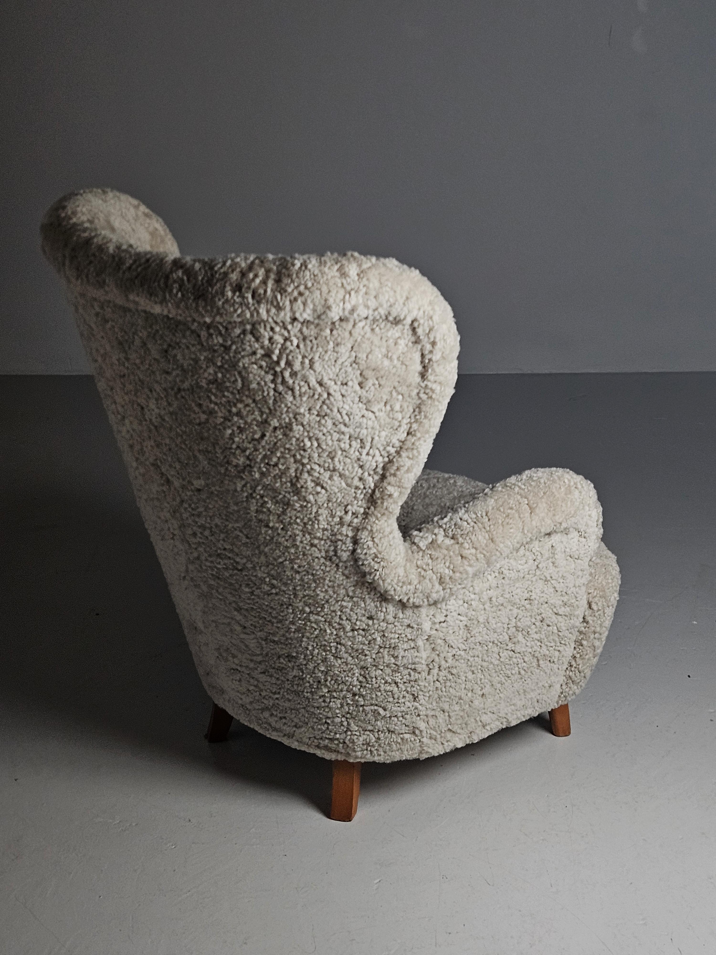 Scandinavian Modern Swedish modern sheepskin easy chair in the style of Otto Schulz, 1950s