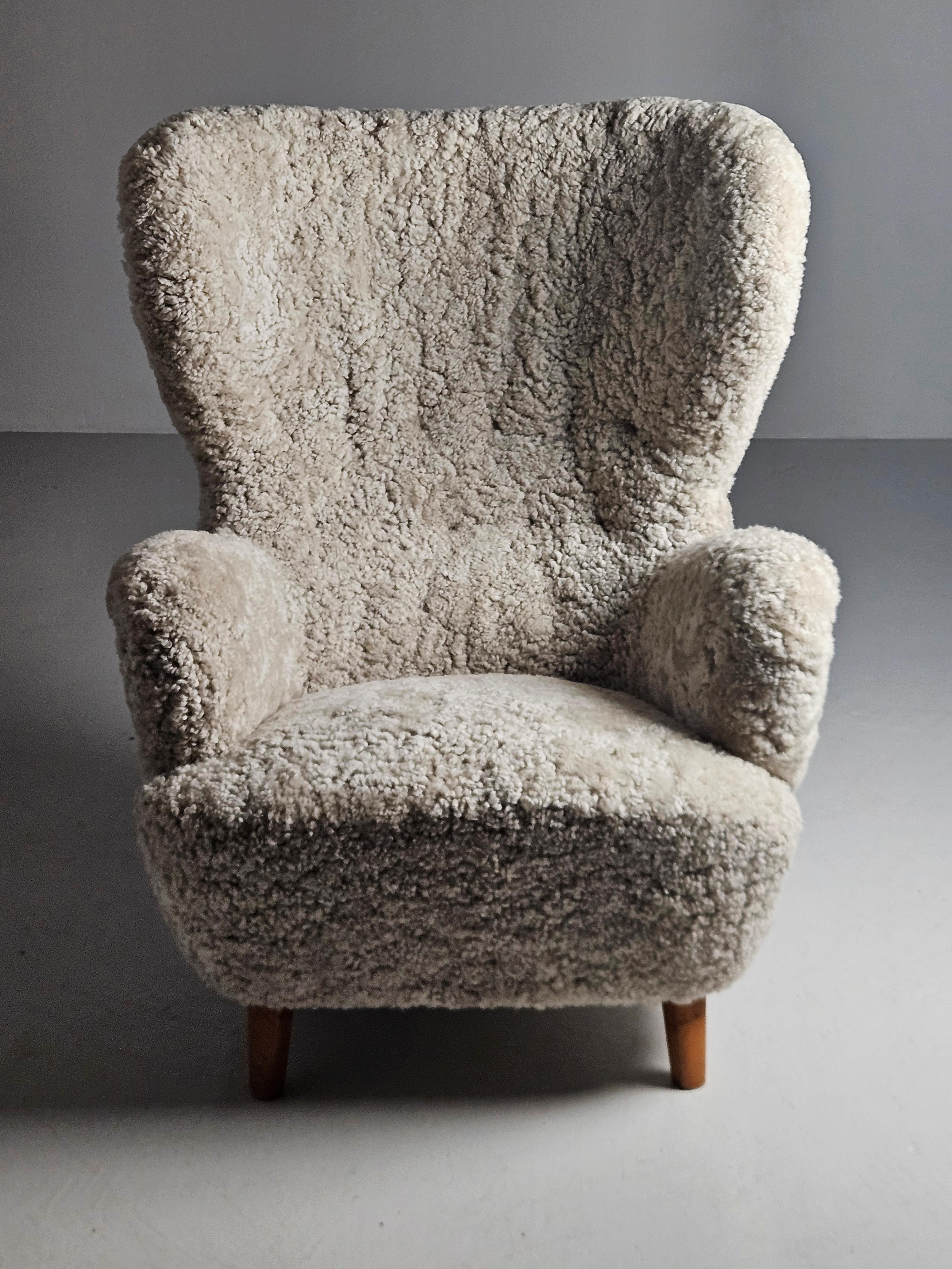 20th Century Swedish modern sheepskin easy chair in the style of Otto Schulz, 1950s