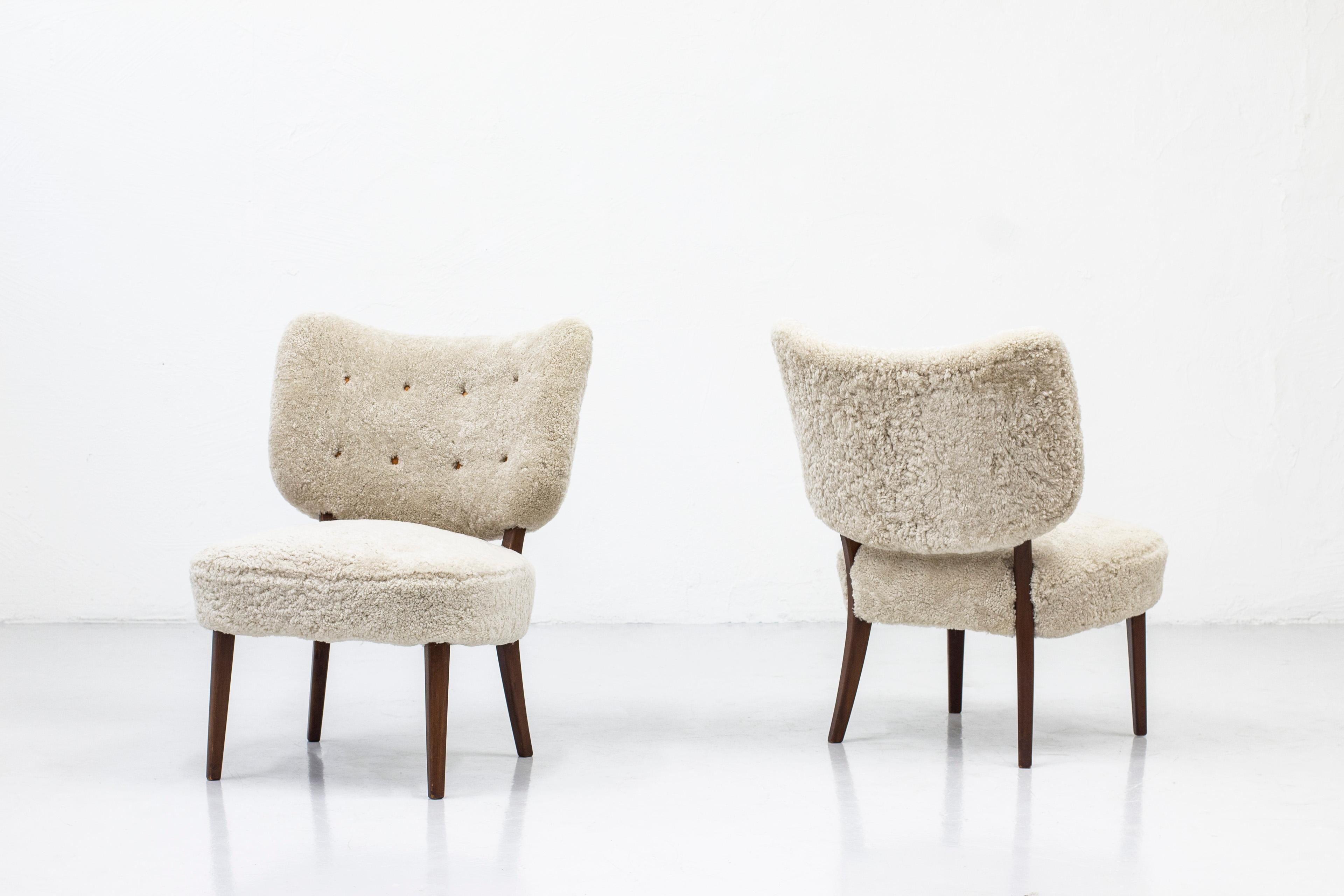 Swedish Modern Sheepskin Lounge Chairs in the Style of Otto Schulz at  1stDibs