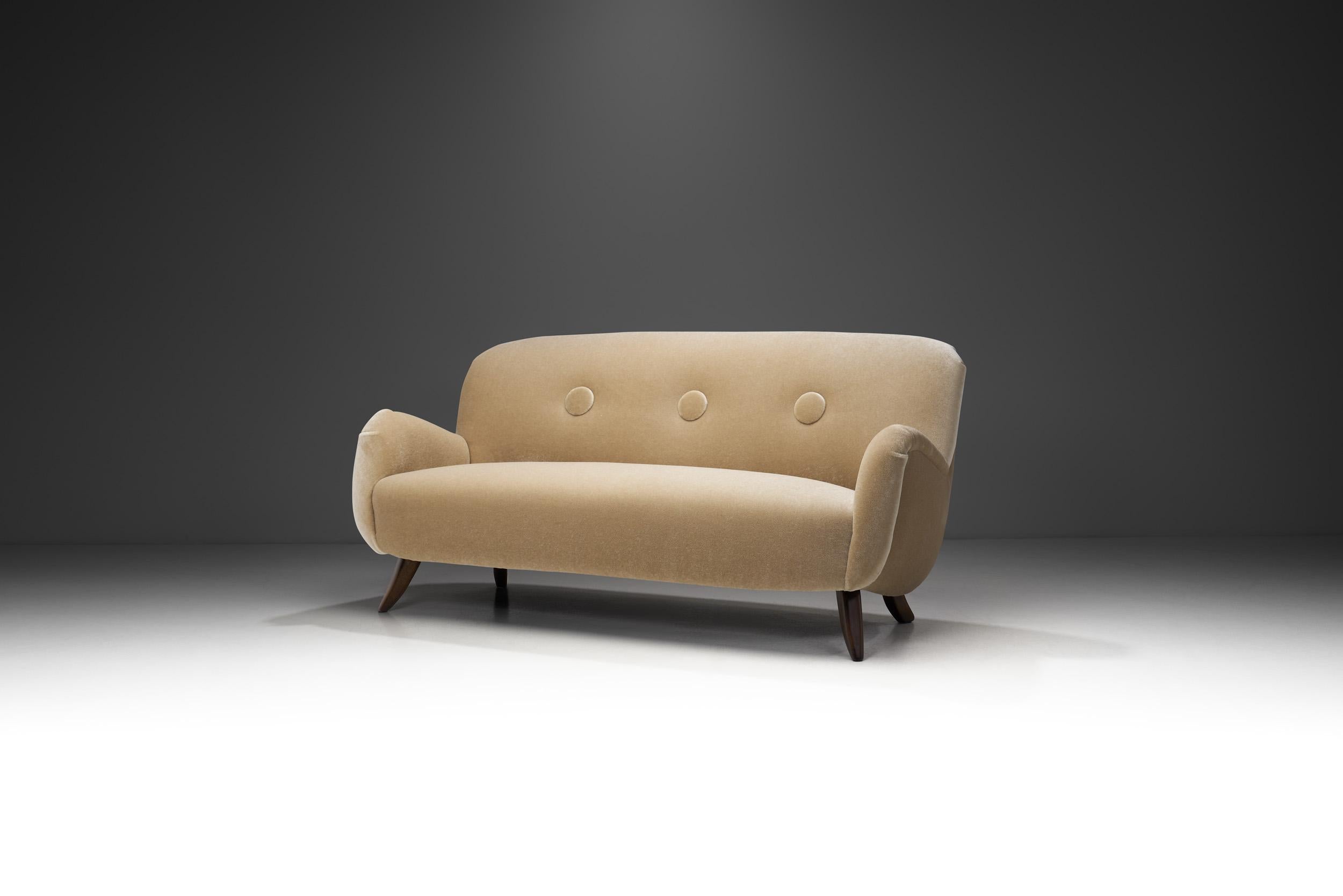 Designed in the early phase of what we know today as mid-century modern, this charming sofa is a unique evidence of how traditional Swedish craftsmanship was brought into modernism. A functional anchor piece is all that is needed to introduce