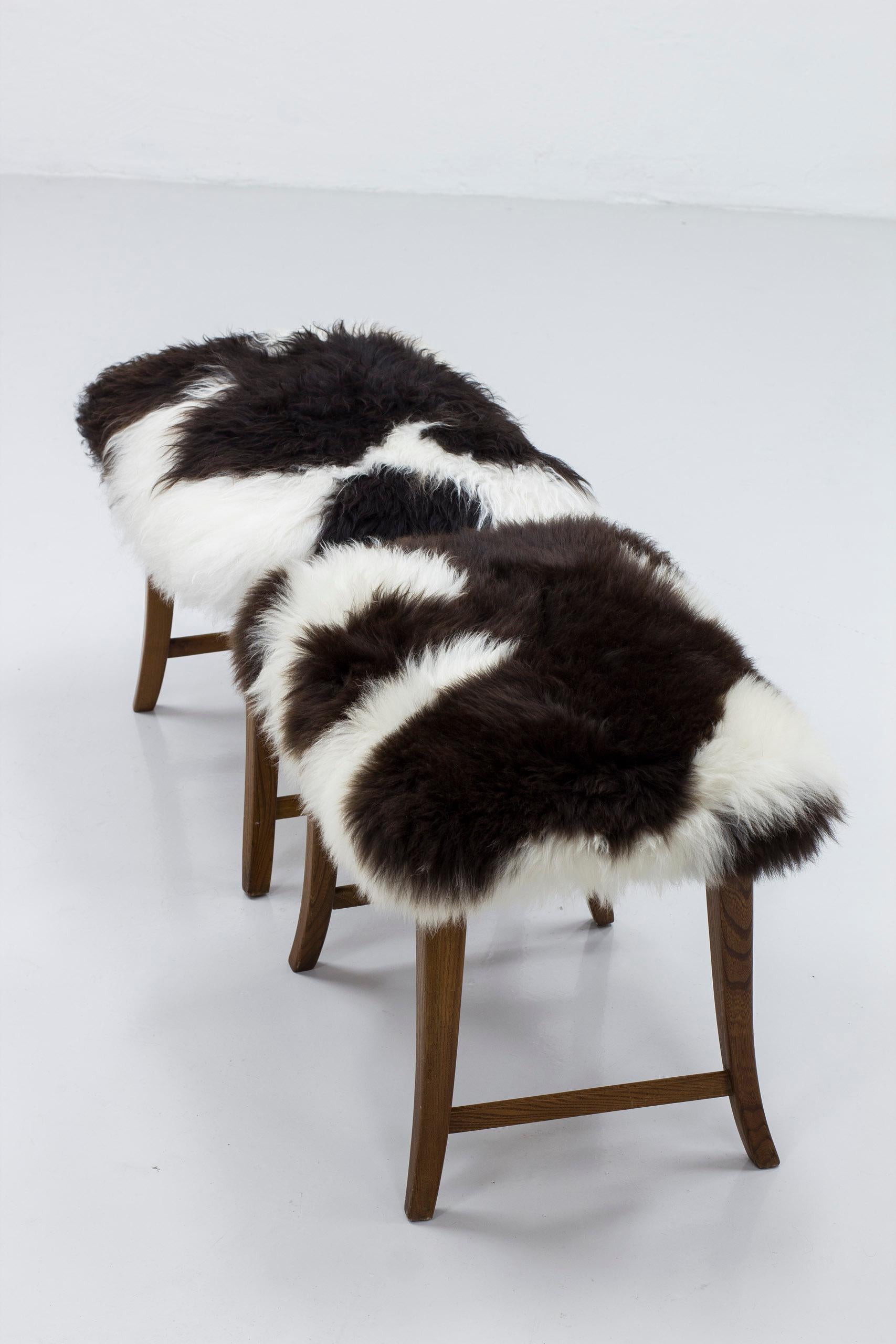 Mid-20th Century Swedish modern solid elm stools with sheepskin, 1940s, Sweden For Sale