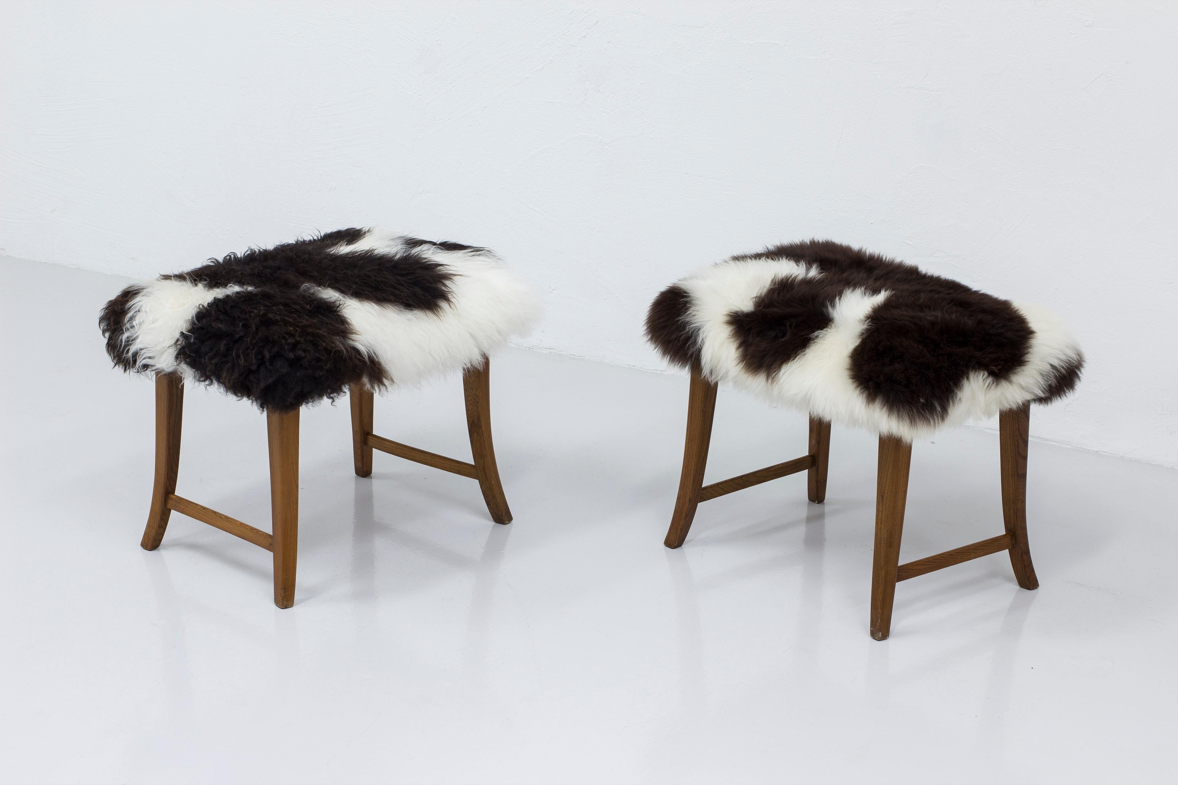 Sheepskin Swedish modern solid elm stools with sheepskin, 1940s, Sweden For Sale