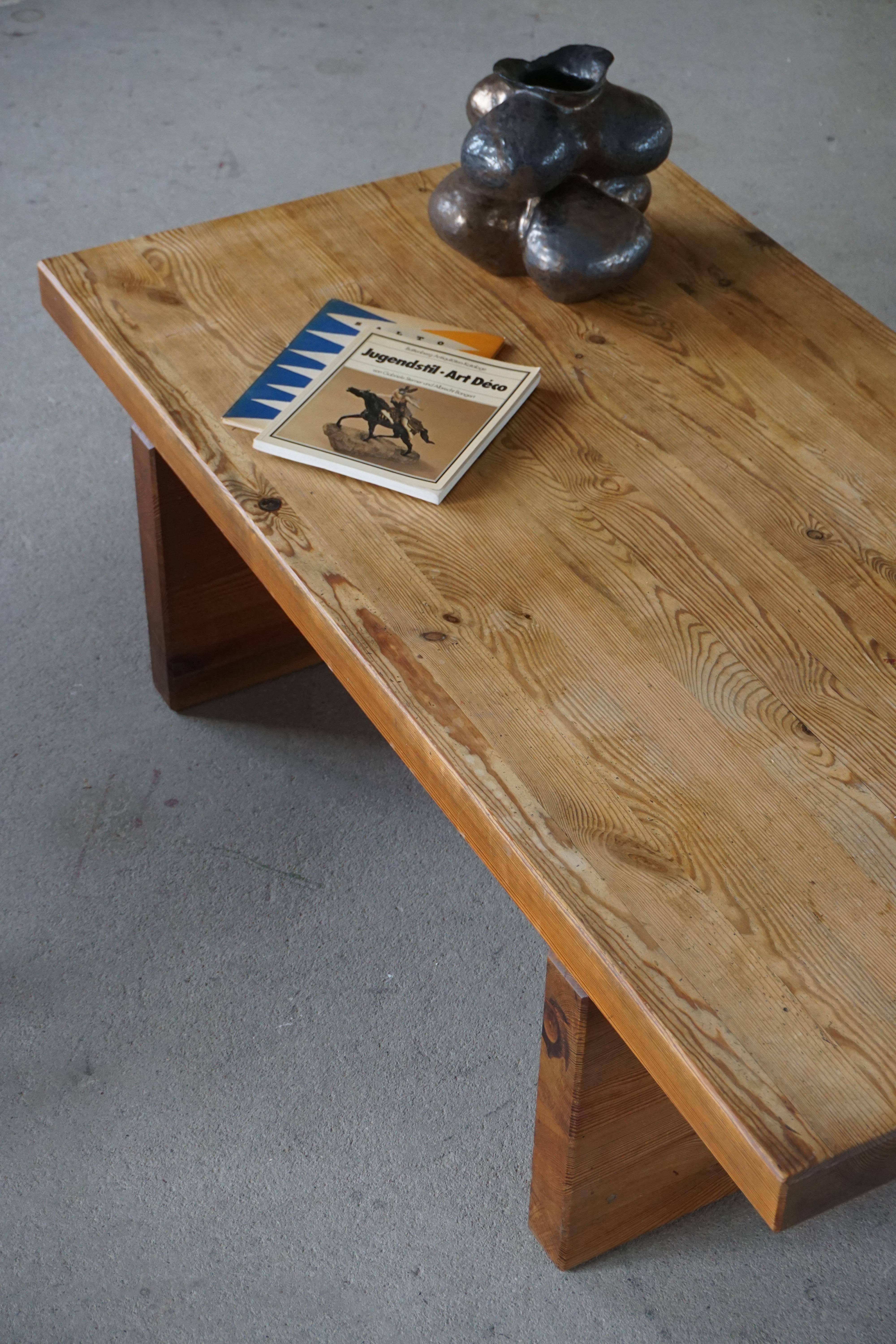 Brutalist coffee table made in solid pine. Swedish modern from 1960s. 

The coffee table shows a lovely patina.

Designers worth to mention from this Swedish era is: Roland Wilhelmsson & Sven Larsson.