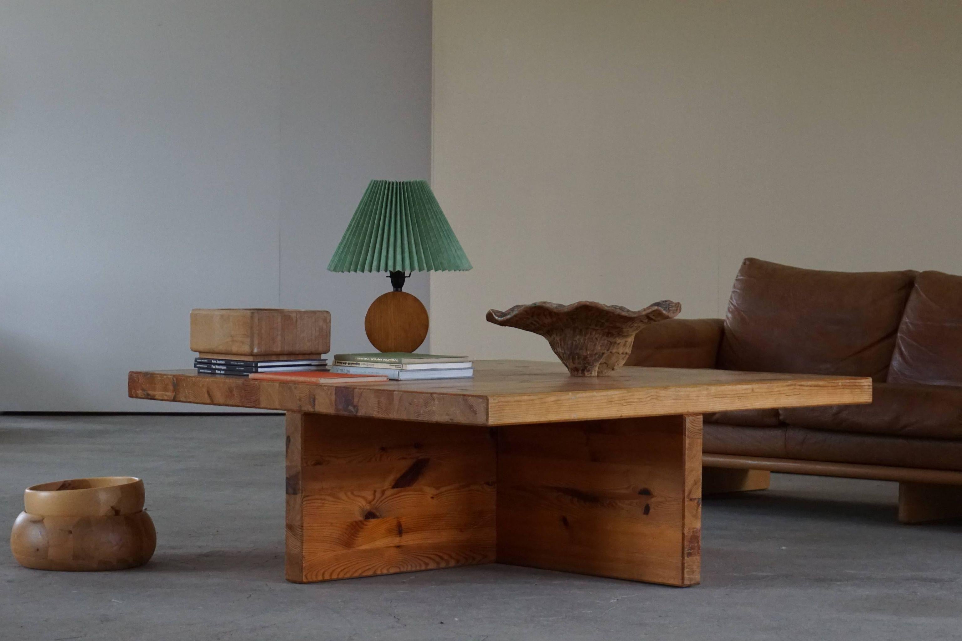 Large square Swedish modern coffee table in solid pine, made by Sven Larsson in 1970s.

A great brutalist object with a nice patina. 

Honorabel mentions in the same style: Roland Wilhelmsson, Axel Einar Hjorth.