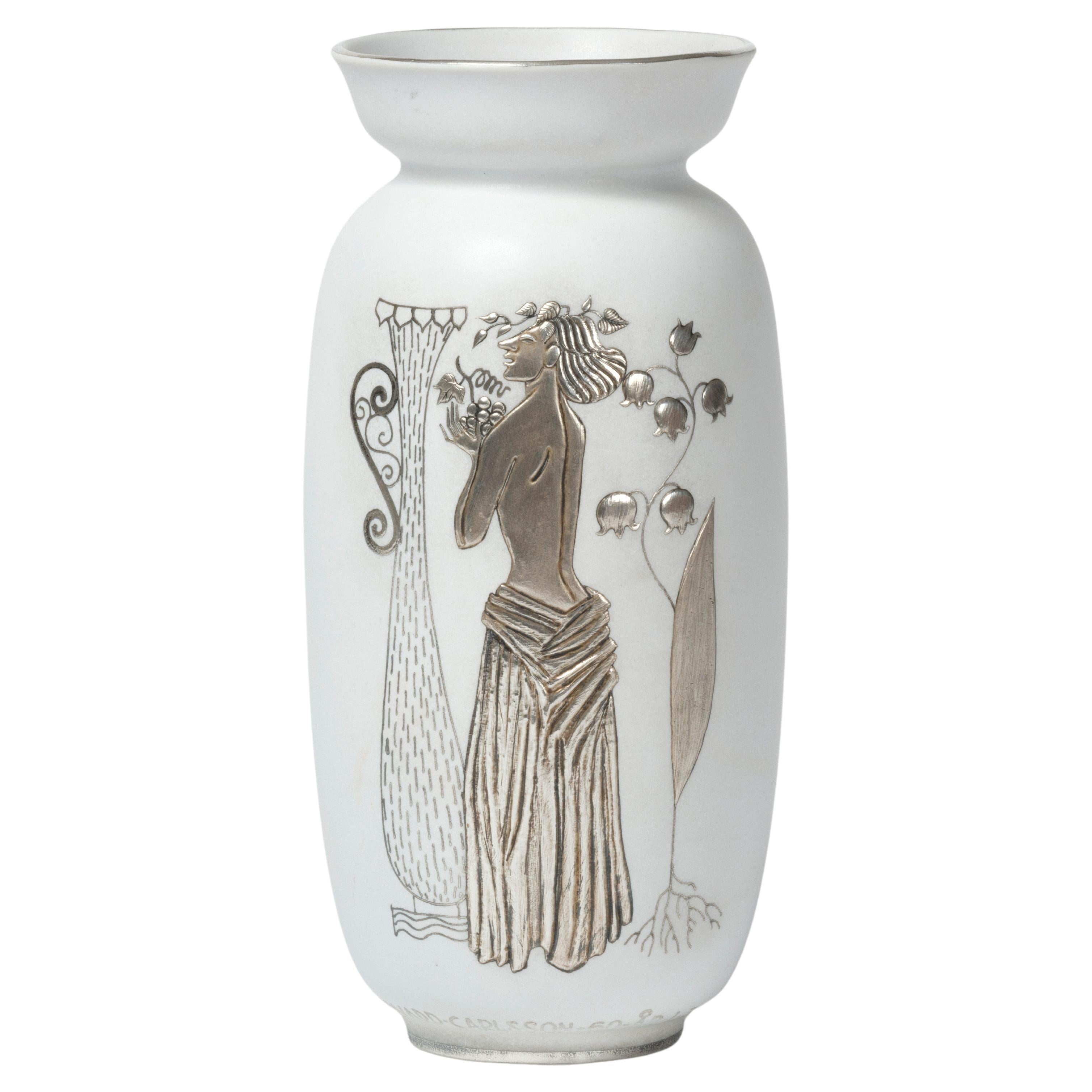 Swedish modern Stig Lindberg Grazia model 215 white stoneware and silver vase For Sale