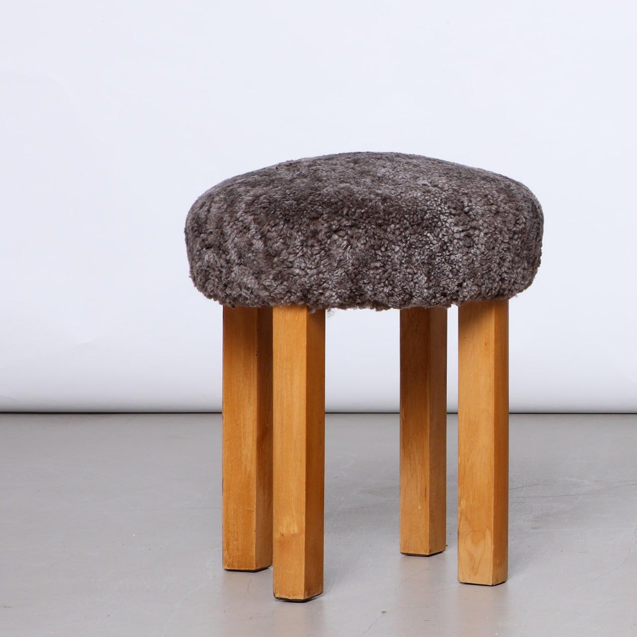 Swedish Modern stool, made by a Swedish cabinetmaker in the 1940s. Newly upholstered in Sahara sheepskin. 

A set of three is available. Please refer to 1stDibs listing number LU6233243879542 or contact us for more information.

Dimensions:
Height: