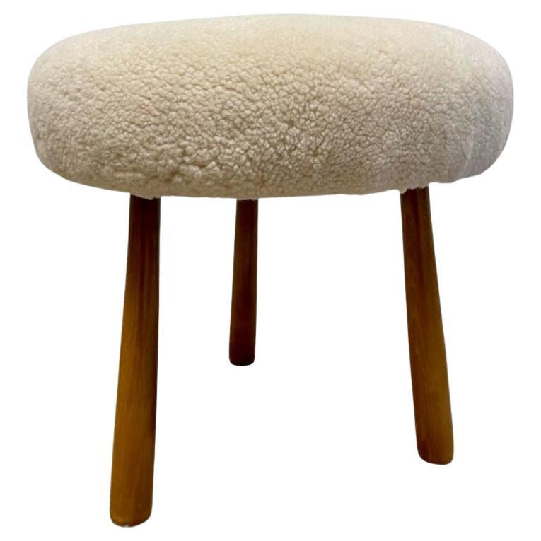 Swedish Modern Style, Beige Sheepskin, Stained Wood, Ottoman or Footstool For Sale