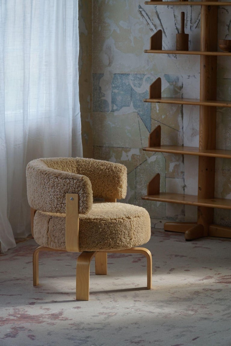Swedish Modern Swivel Armchair in Lambswool by Carina Bengs, Model "Fridene" at 1stDibs