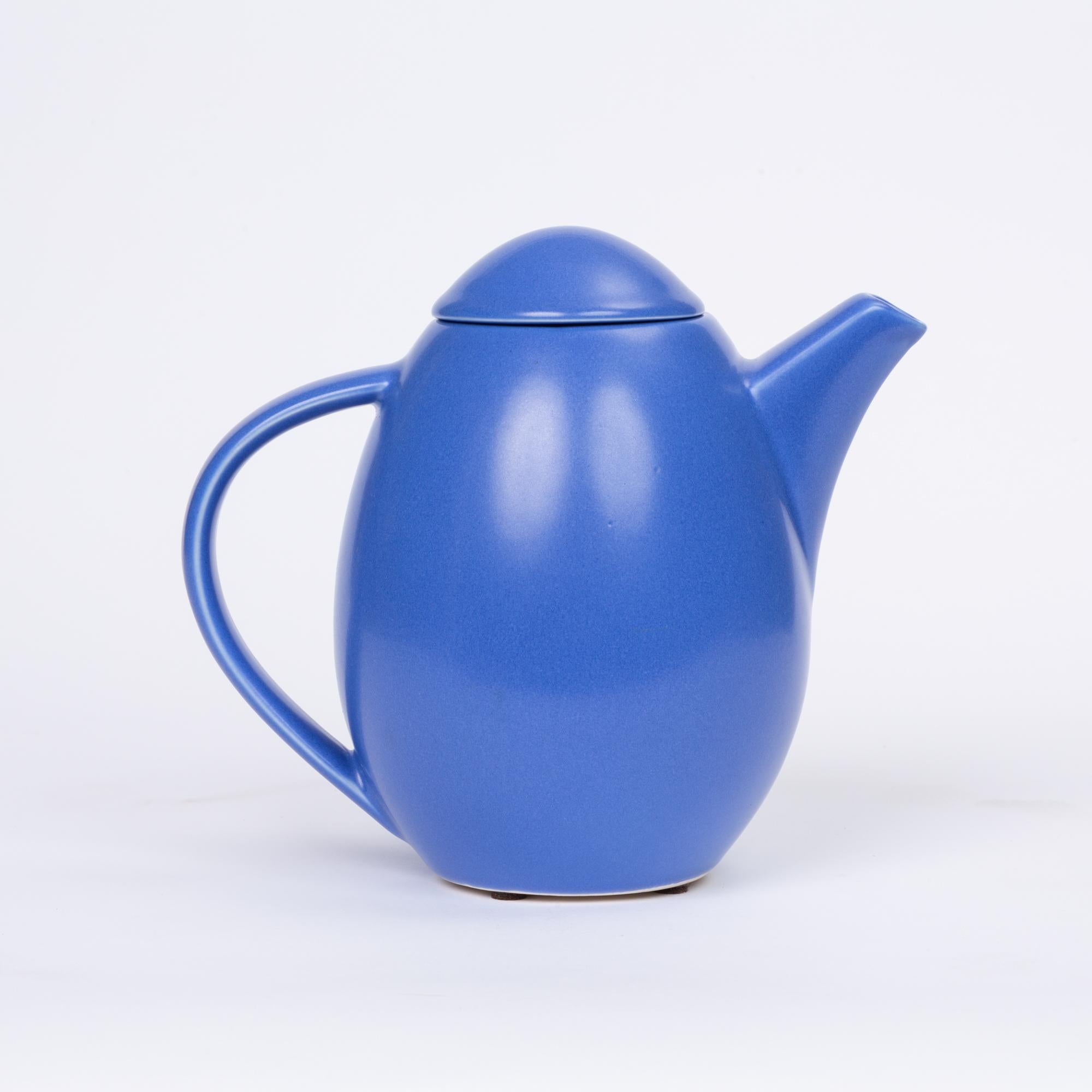 Ceramic teapot by Höganäs Keramik. Such a fun pop of color! This teapot by the notable Swedish dinnerware brand features a soft matte blue glaze that covers the interior and exterior of both the pot and removable top. Such a fun pop of color!

The