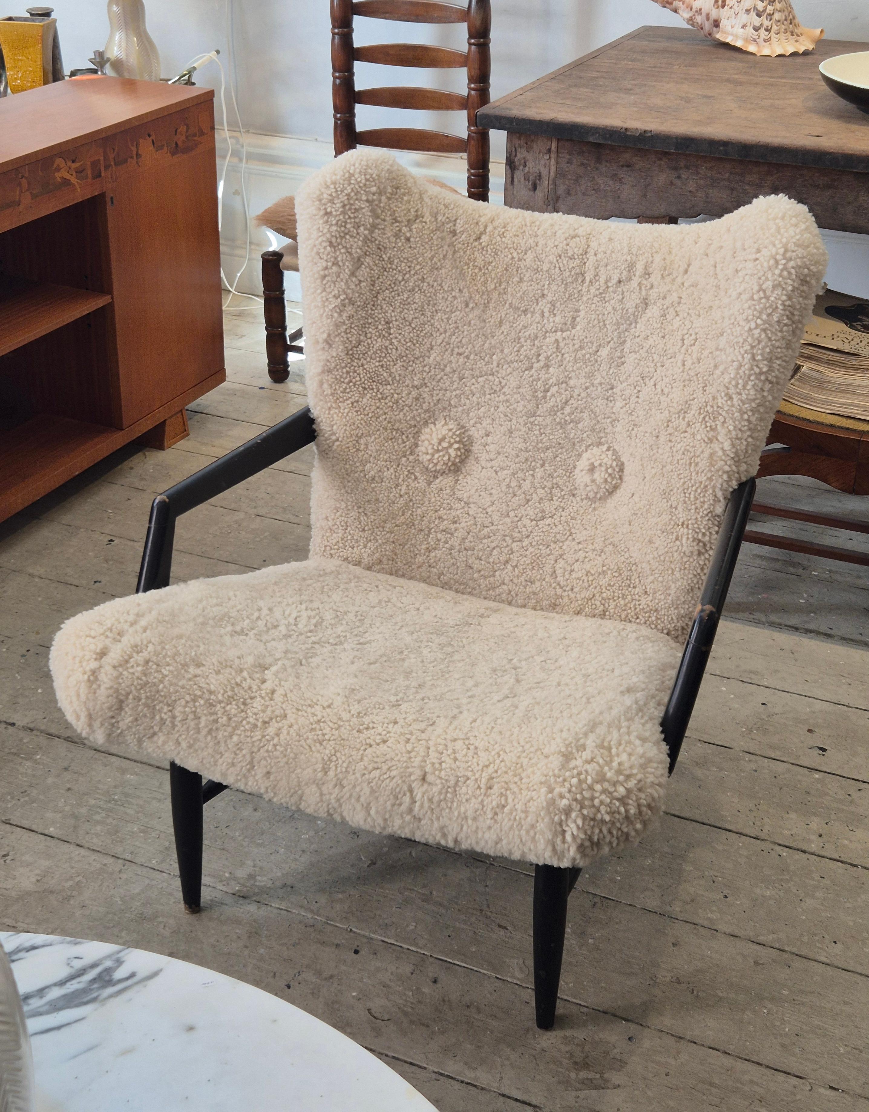Scandinavian Modern Swedish Modern, timeless easy chair in sheepskin, by Svante Skogh. Nice patina. For Sale