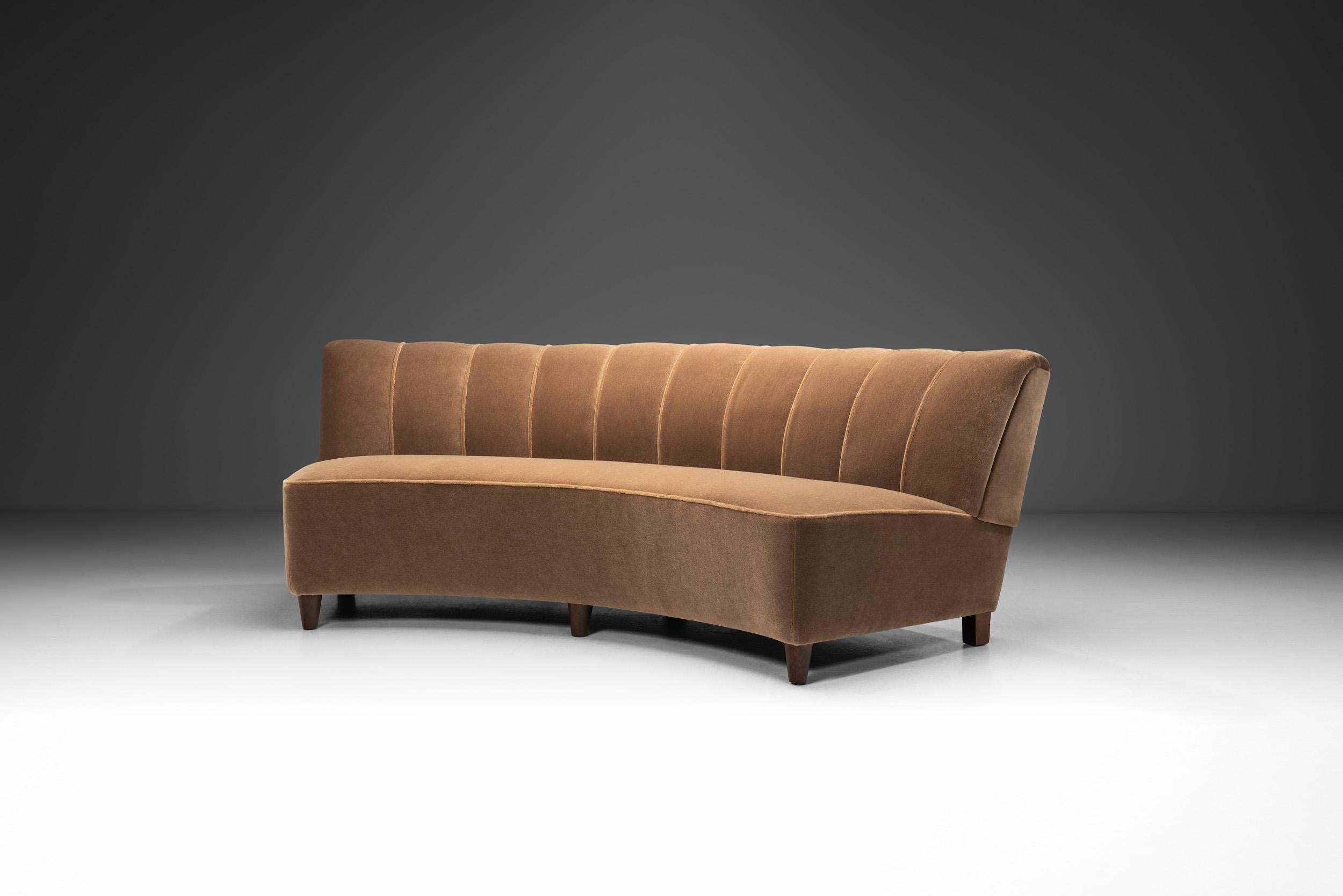 Designed in the early phase of what we know today as mid-century modern movement, this charming sofa is a unique piece of evidence of how traditional Swedish craftsmanship was brought into modernism. It beautifully embodies the clean lines and
