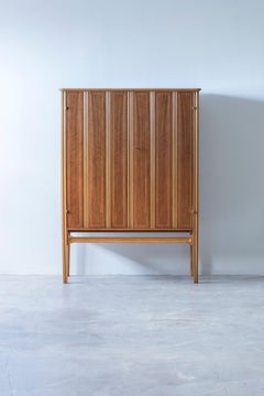 Swedish modern walnut and beech relief cabinet by David Blomberg, 1940s