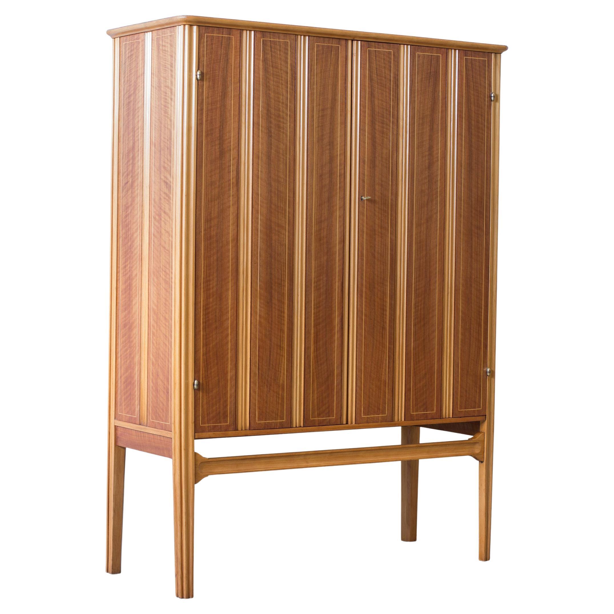 Swedish modern walnut and beech relief cabinet by David Blomberg, 1940s