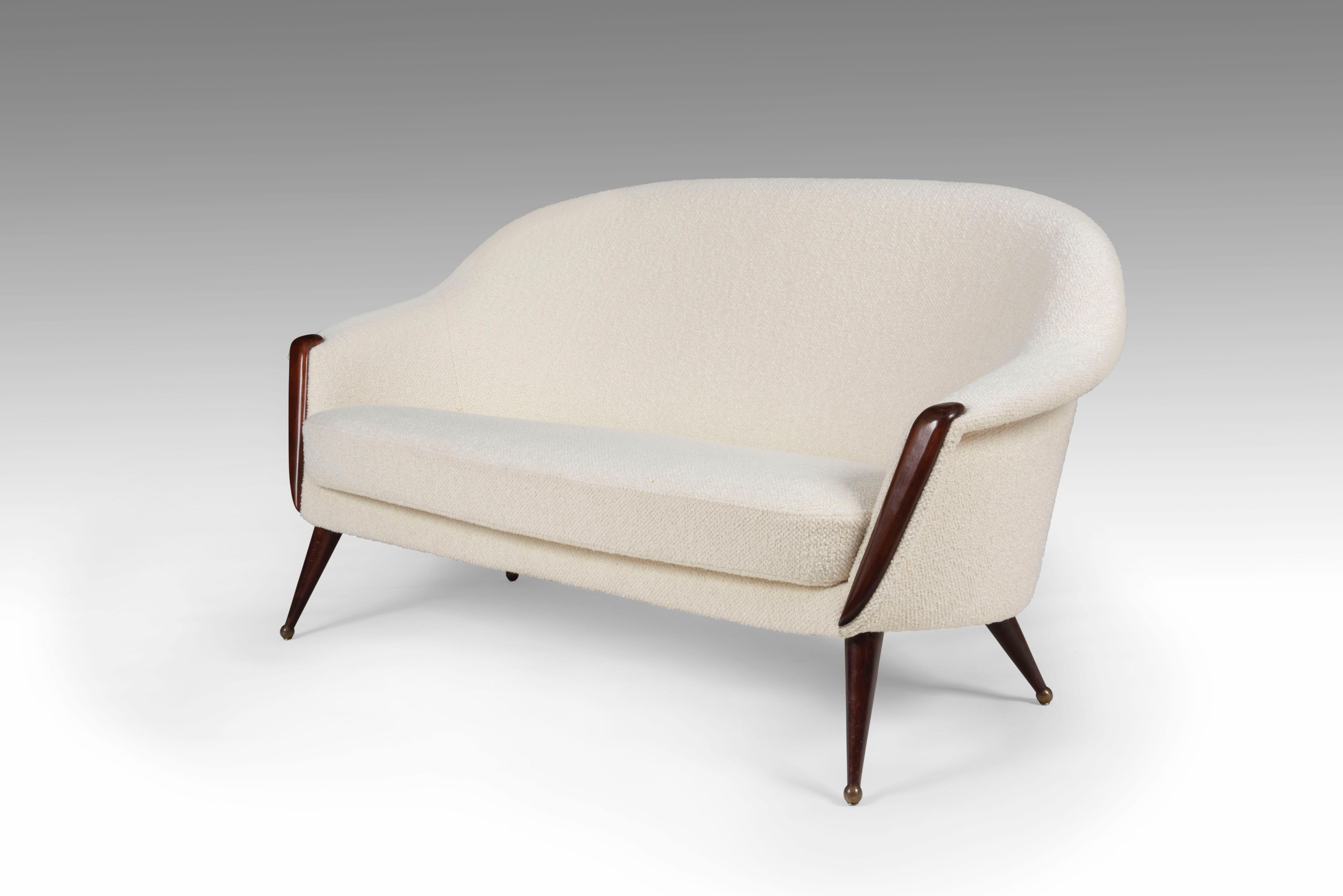 Rare model Orion wool and beechwood sofa with brass details by Folke Jansson. 
Firm yet comfortable. 

Produced by SM Wincrantz in Sweden in 1950's. 

Reupholstered in wool bouclé.