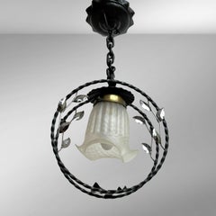 Swedish modern wrought iron pendant lamp with organic leaf decor, 1940s