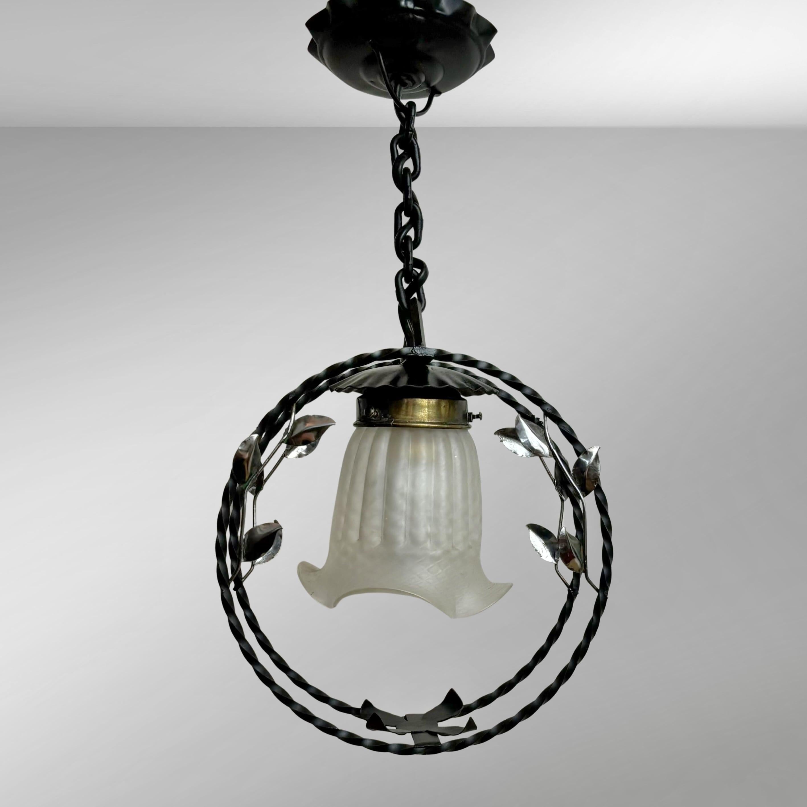 Swedish modern wrought iron pendant lamp with organic leaf decor, 1940s In Good Condition For Sale In Forserum, SE