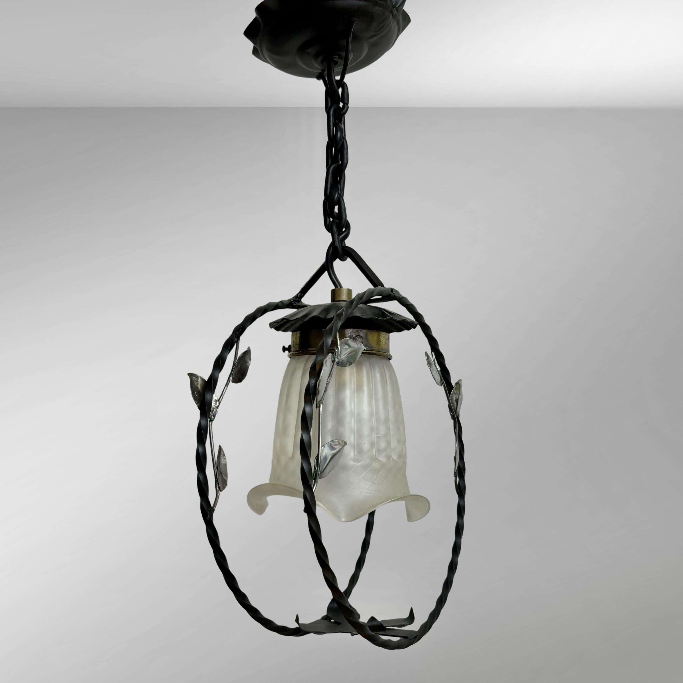 Glass Swedish modern wrought iron pendant lamp with organic leaf decor, 1940s For Sale