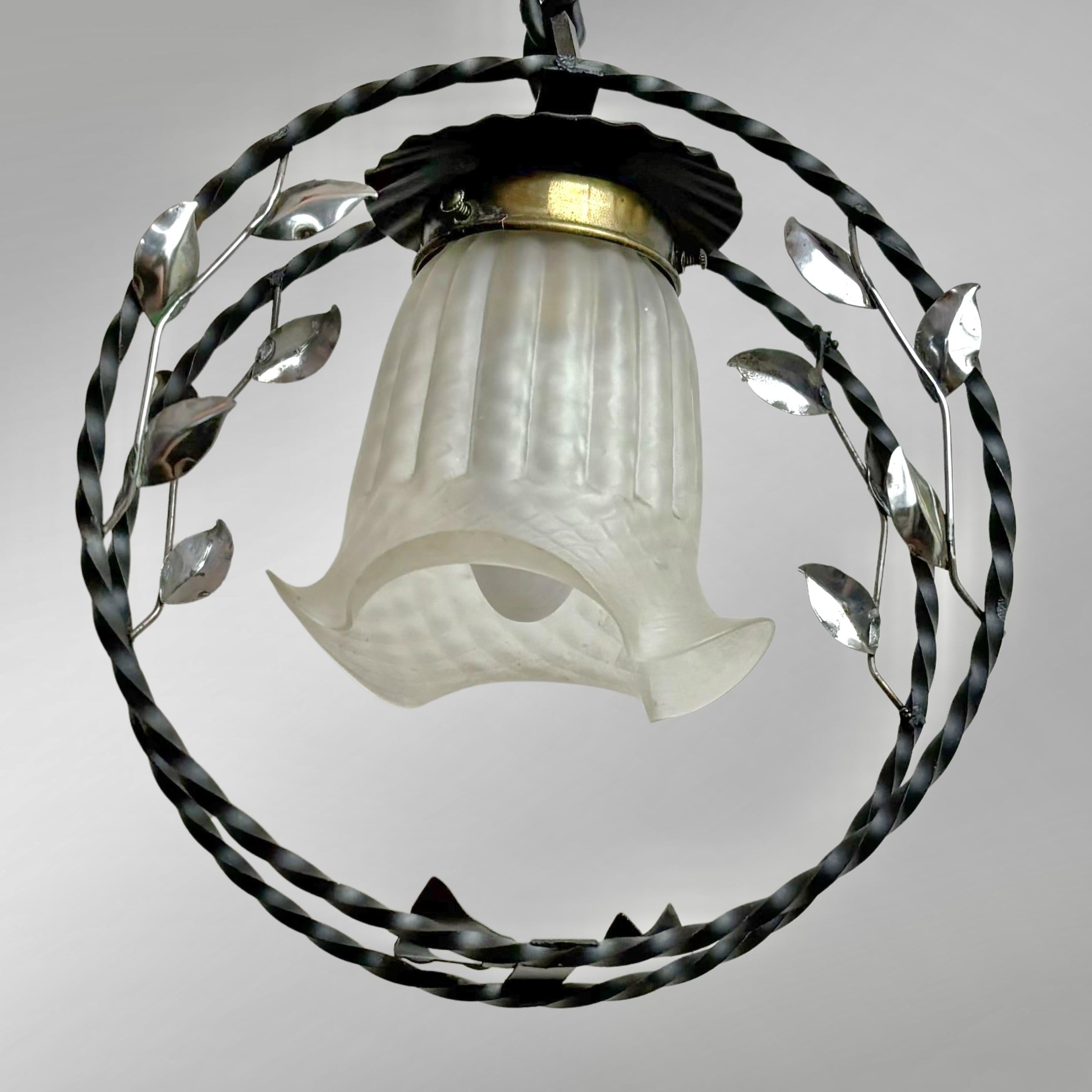 Swedish modern wrought iron pendant lamp with organic leaf decor, 1940s For Sale 1